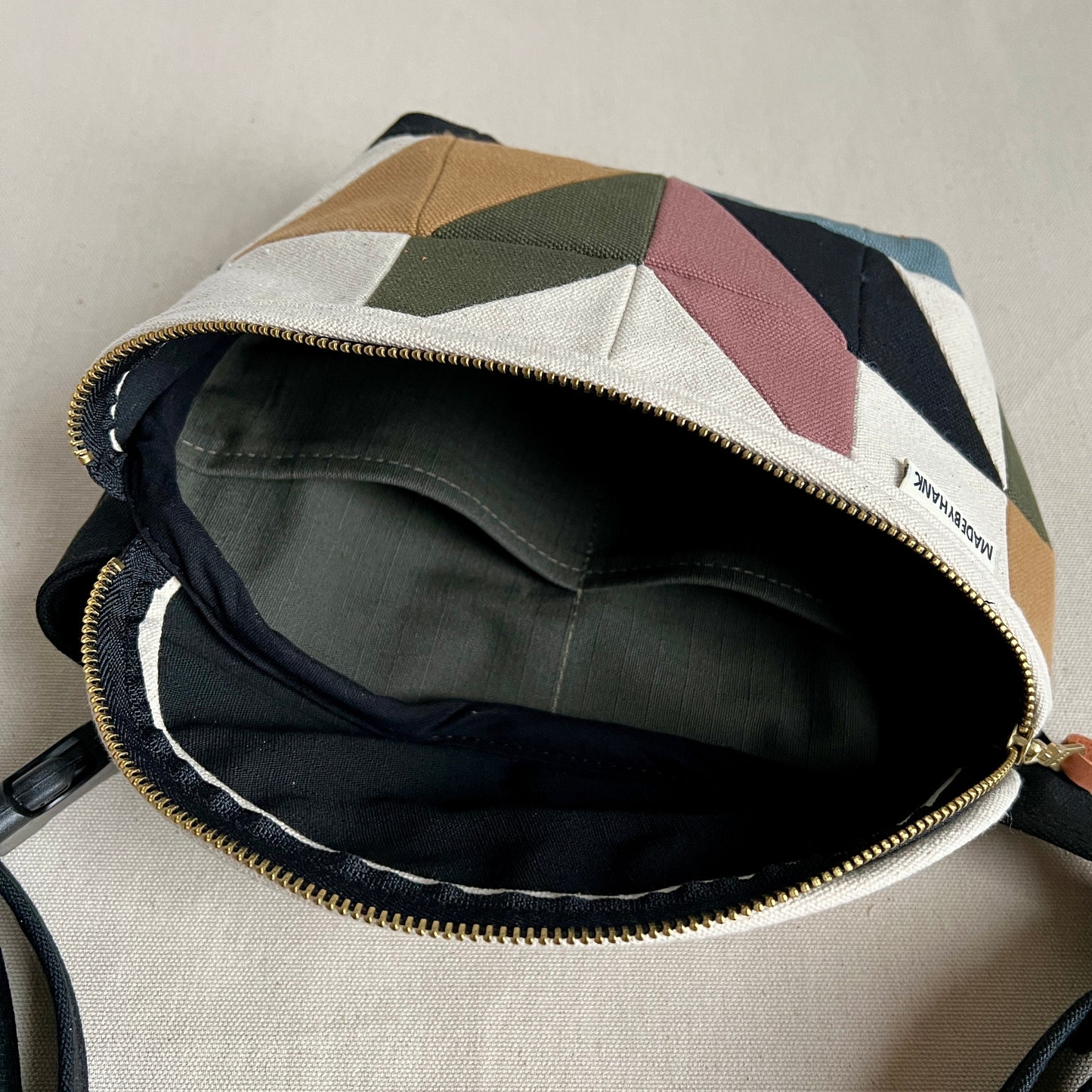 pinwheel star fanny bag, natural with mauve/black/forest/steel/honey/pink