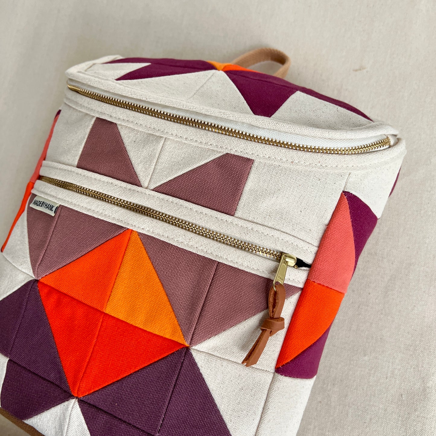 sawtooth star backpack, natural with mauve, wine + orange