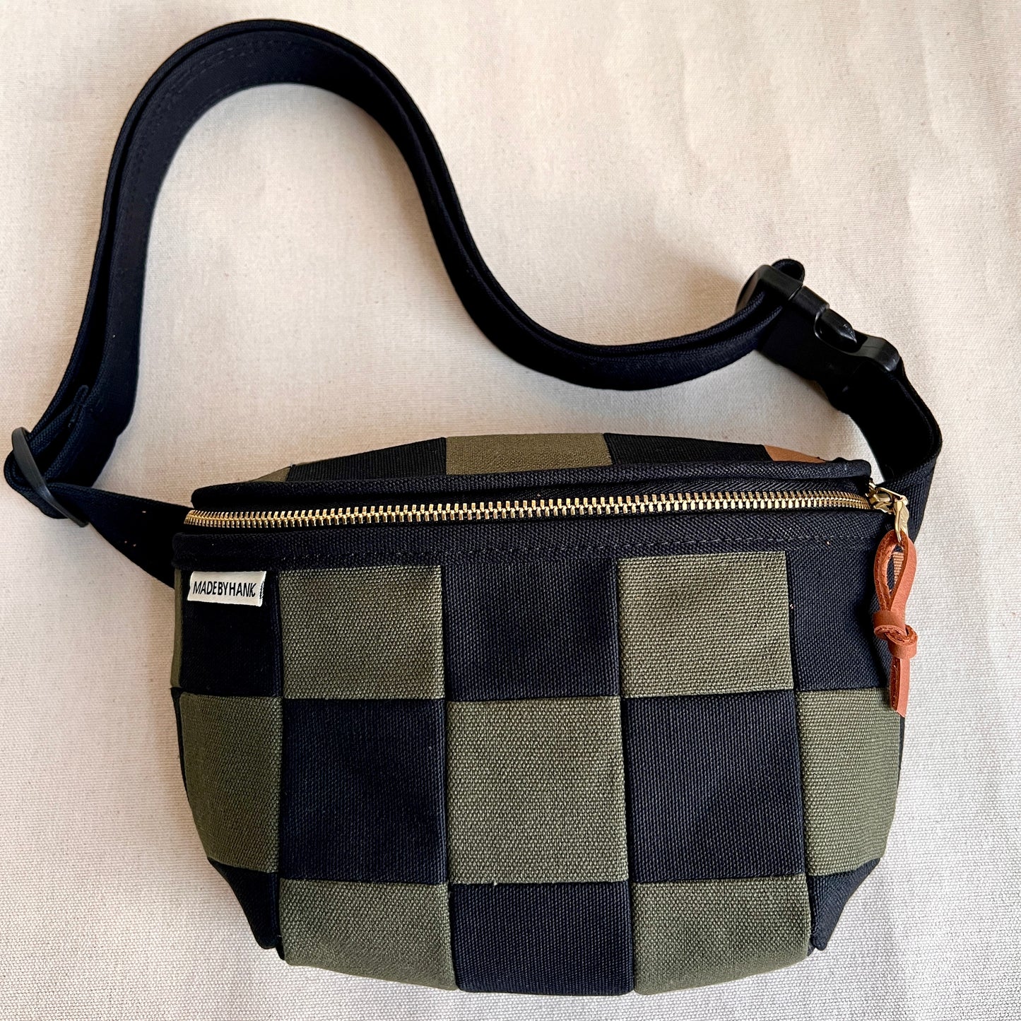 checkerboard fanny bag, black+forest with caramel
