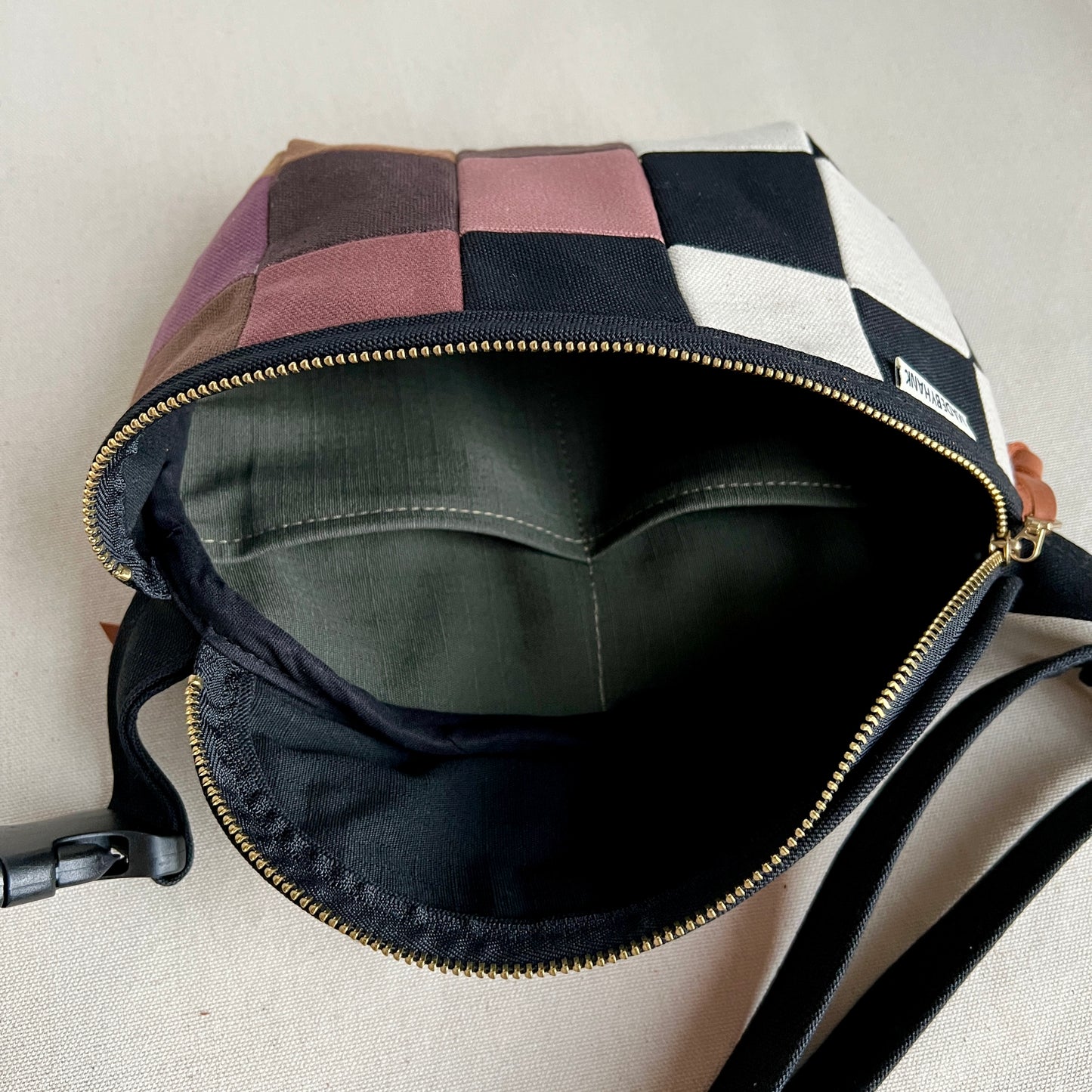 checkerboard fanny bag, black + natural with mauve +browns