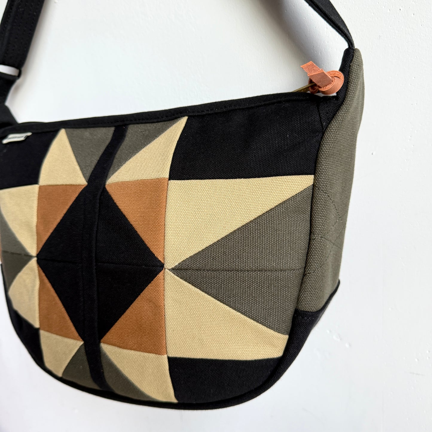 crescent shoulder bag, black with honey/ forest/caramel