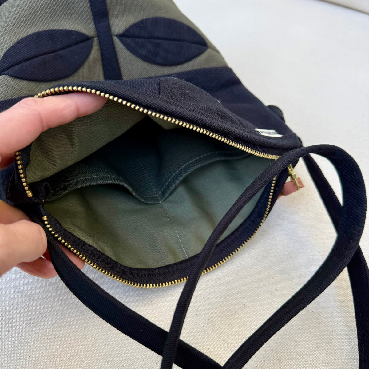 The Emmy Crossbody, pieced work tulip in dark olive/black/natural/neon