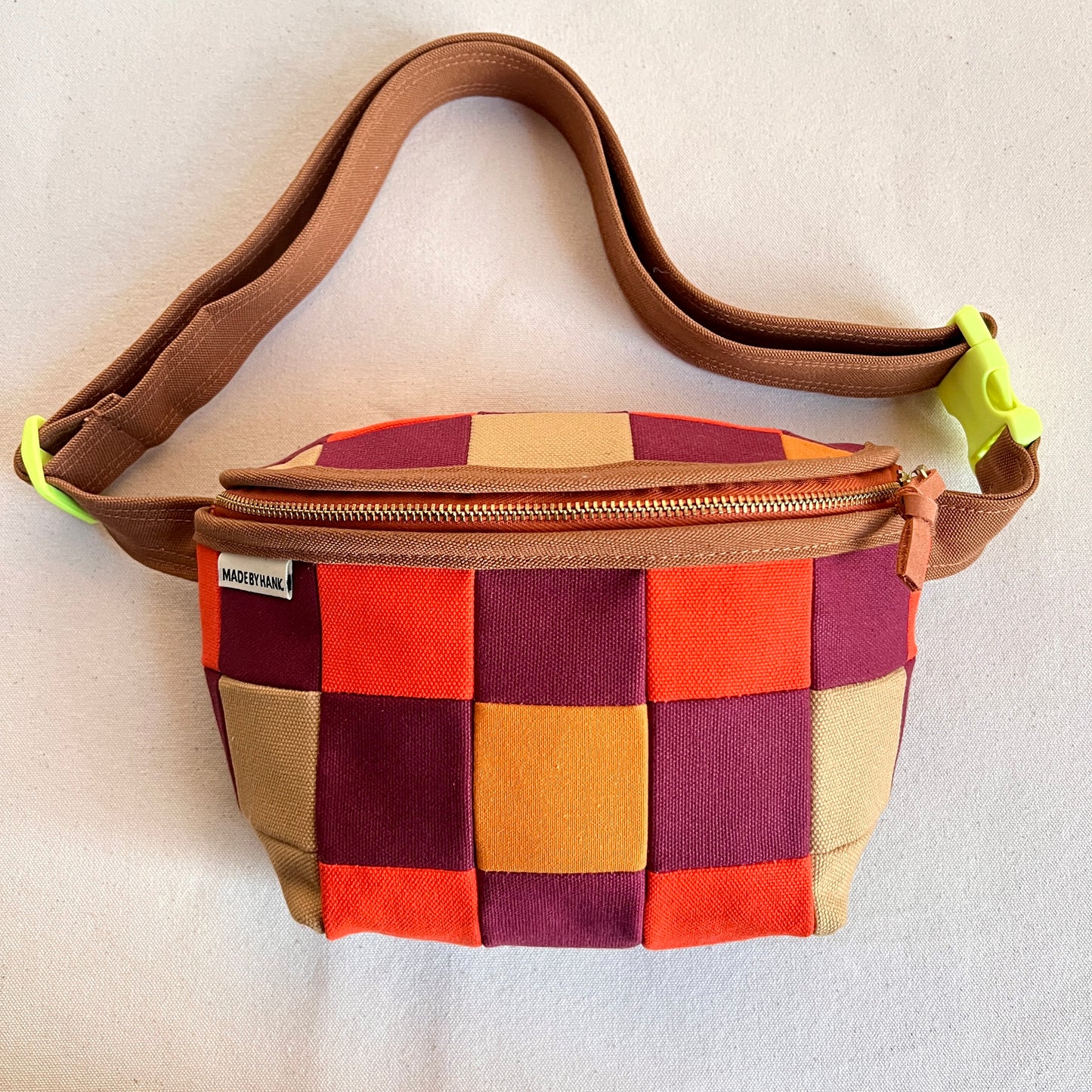 checkerboard fanny bag, honey/hot orange/wine (with neon buckle!)
