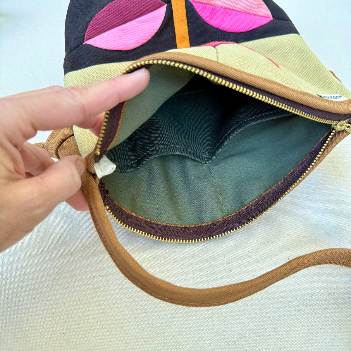 The Emmy Crossbody, pieced work tulip in honey and espresso with pinks