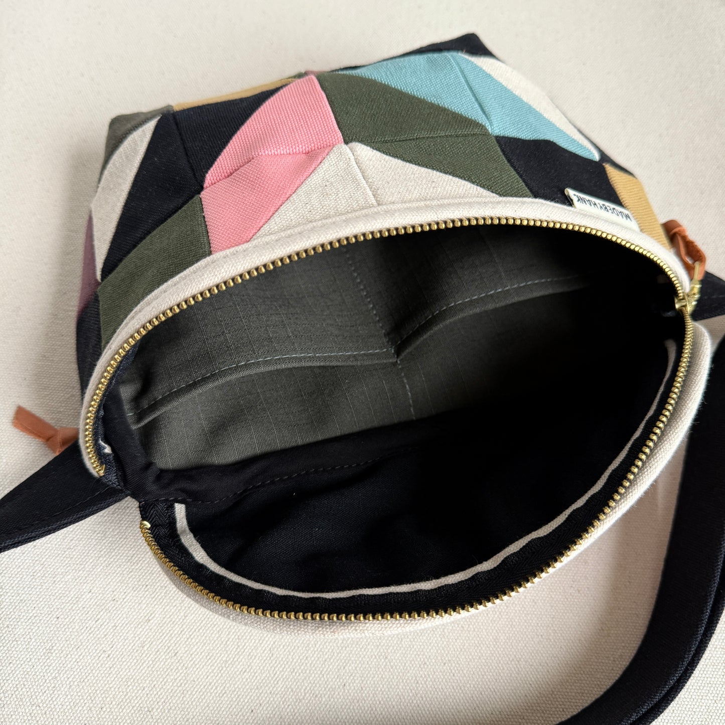 pinwheel star fanny bag, natural with mauve/black/forest/steel/honey/pink