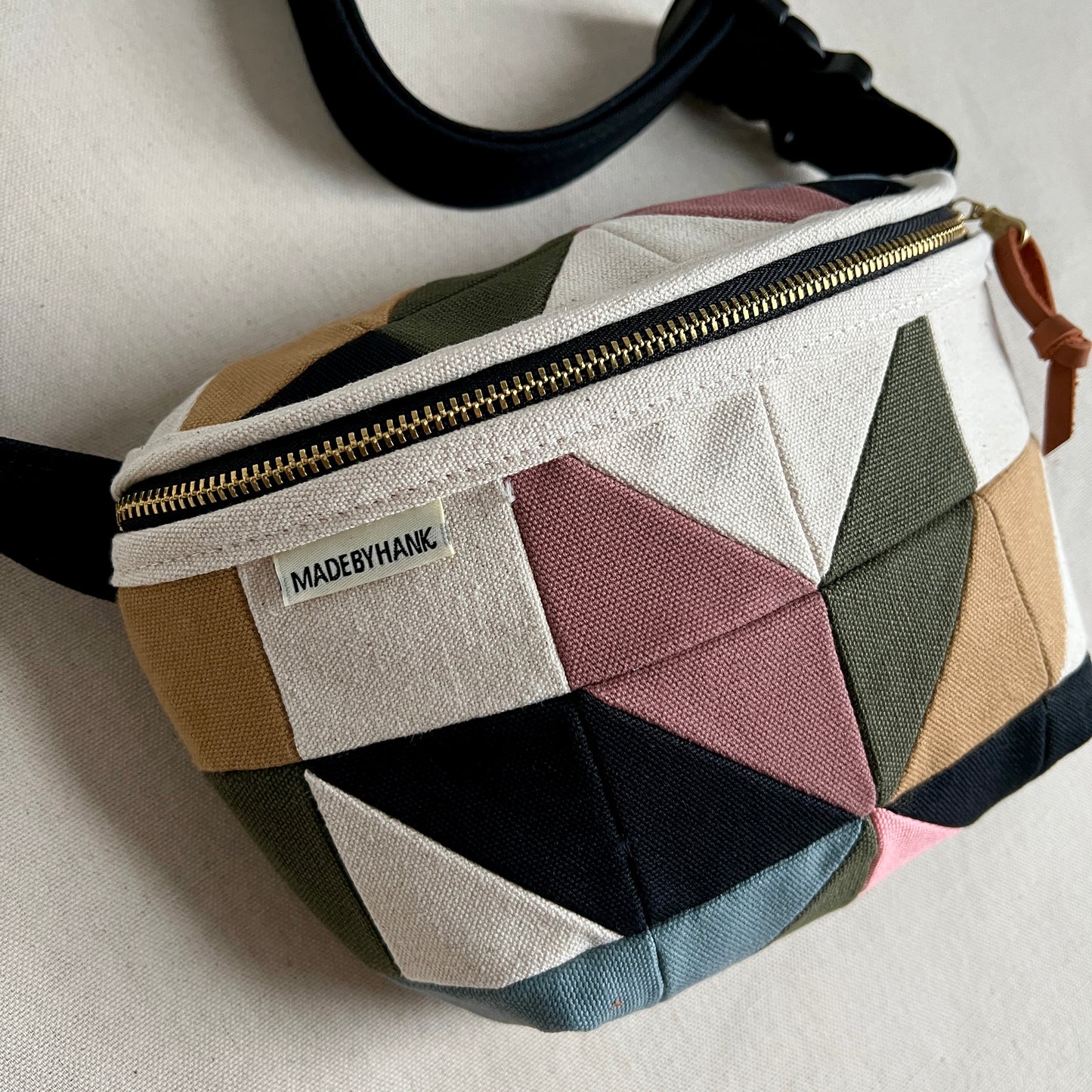 pinwheel star fanny bag, natural with mauve/black/forest/steel/honey/pink