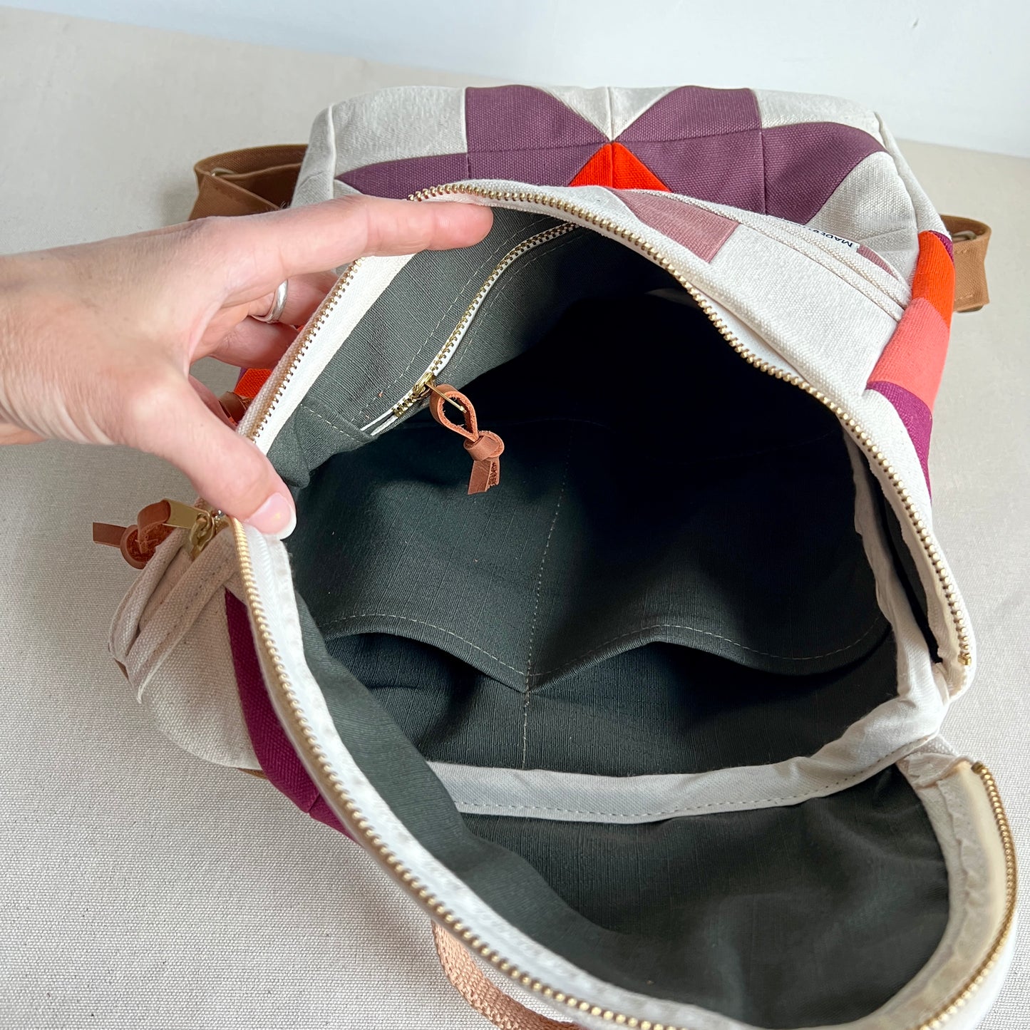 sawtooth star backpack, natural with mauve, wine + orange