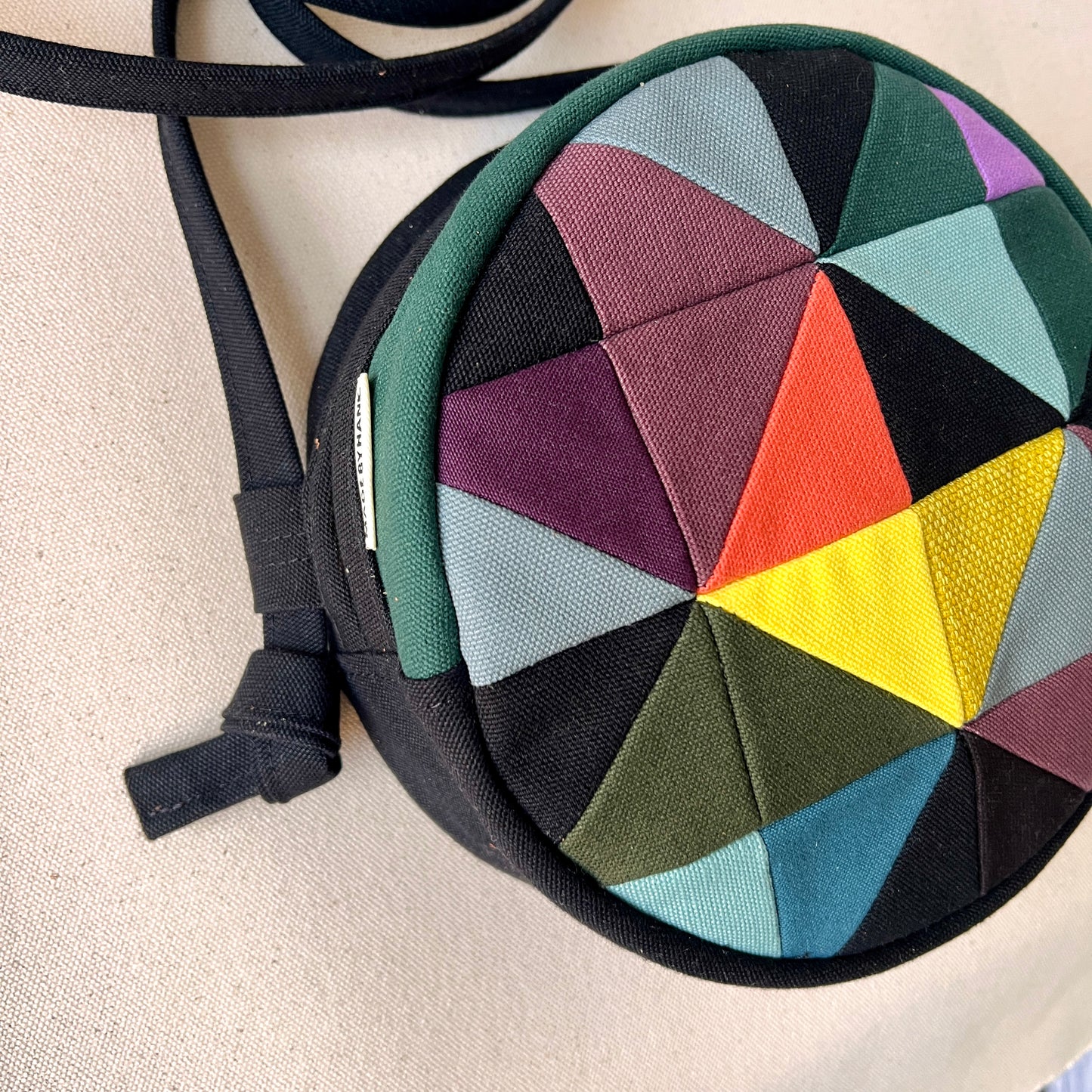 circle crossbody, black/raisin/aqua/lemon/spruce etc