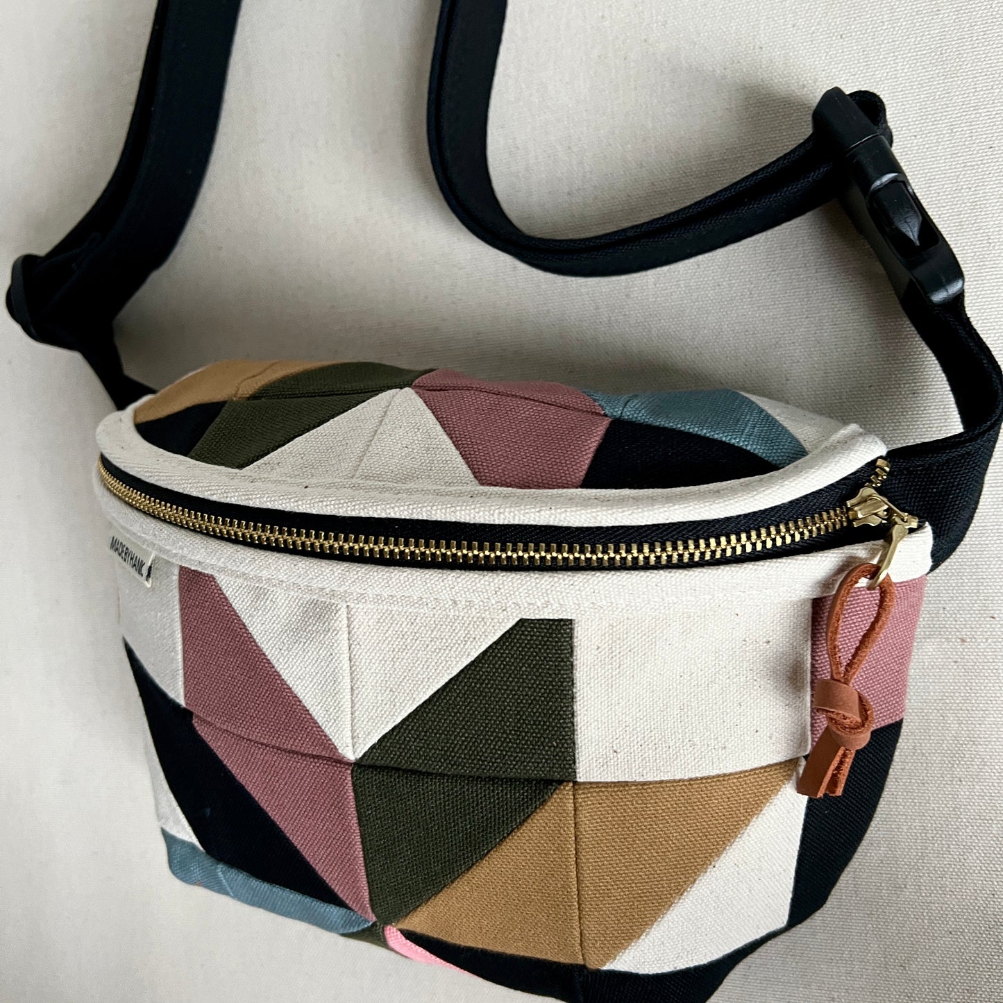 pinwheel star fanny bag, natural with mauve/black/forest/steel/honey/pink