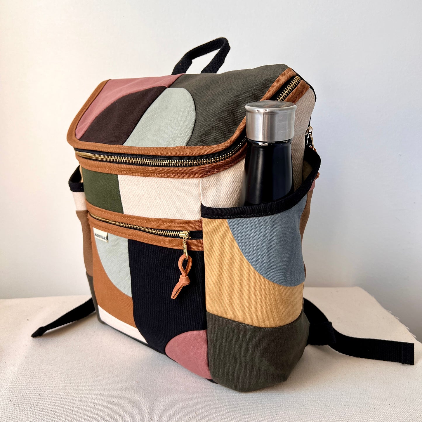 NEW! Roomier Backpack with Side Pockets, Party Neutral