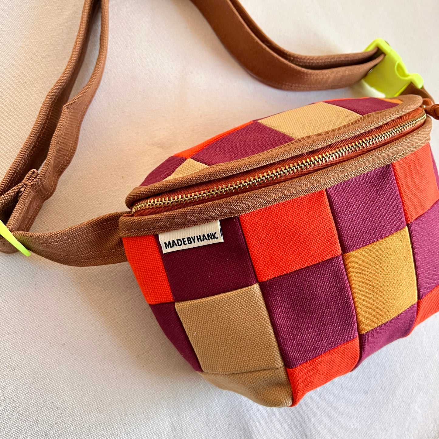 checkerboard fanny bag, honey/hot orange/wine (with neon buckle!)