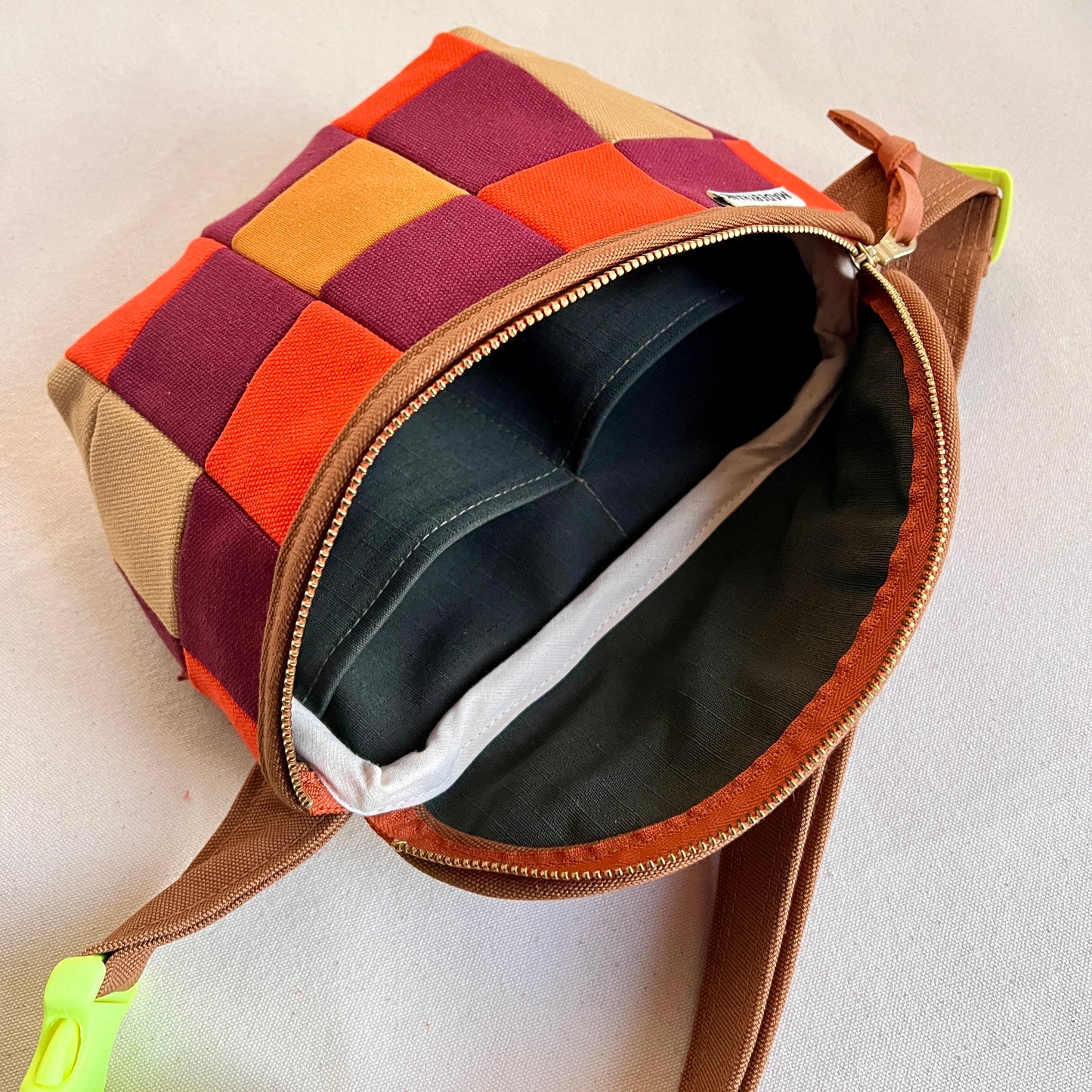 checkerboard fanny bag, honey/hot orange/wine (with neon buckle!)