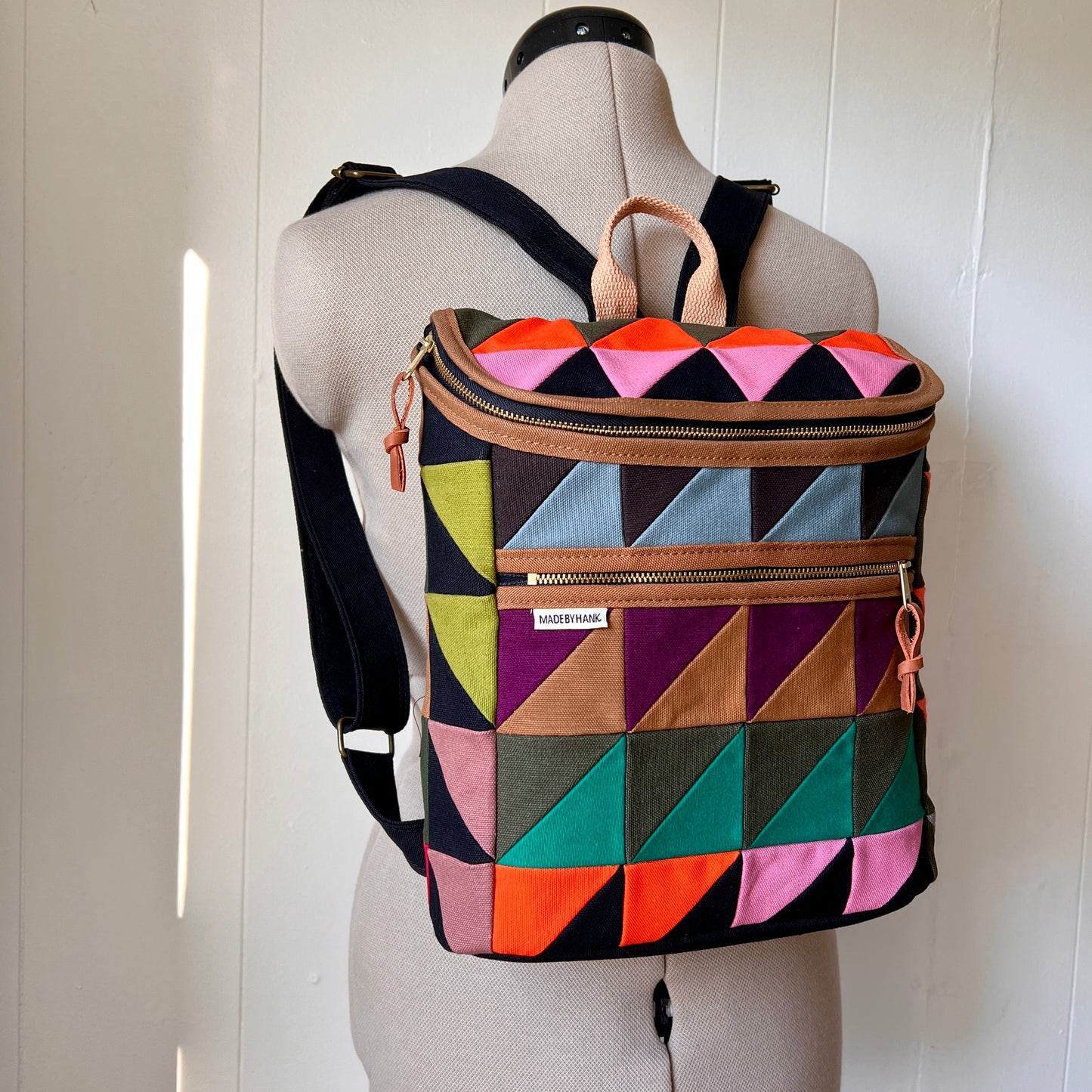 autumnal party traingles backpack omg
