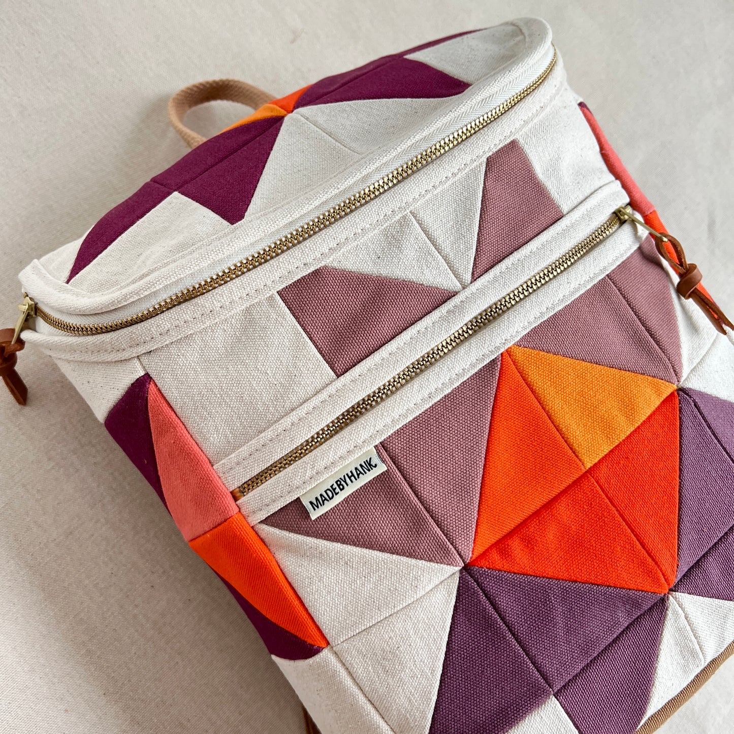 sawtooth star backpack, natural with mauve, wine + orange
