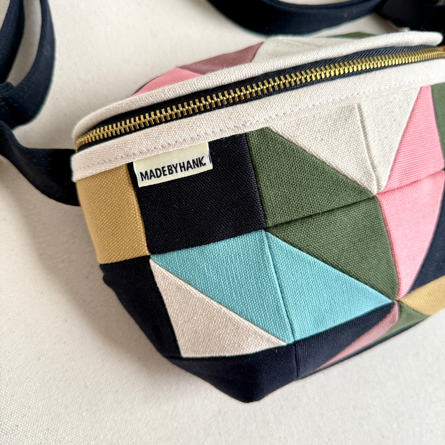 pinwheel star fanny bag, natural with mauve/black/forest/steel/honey/pink