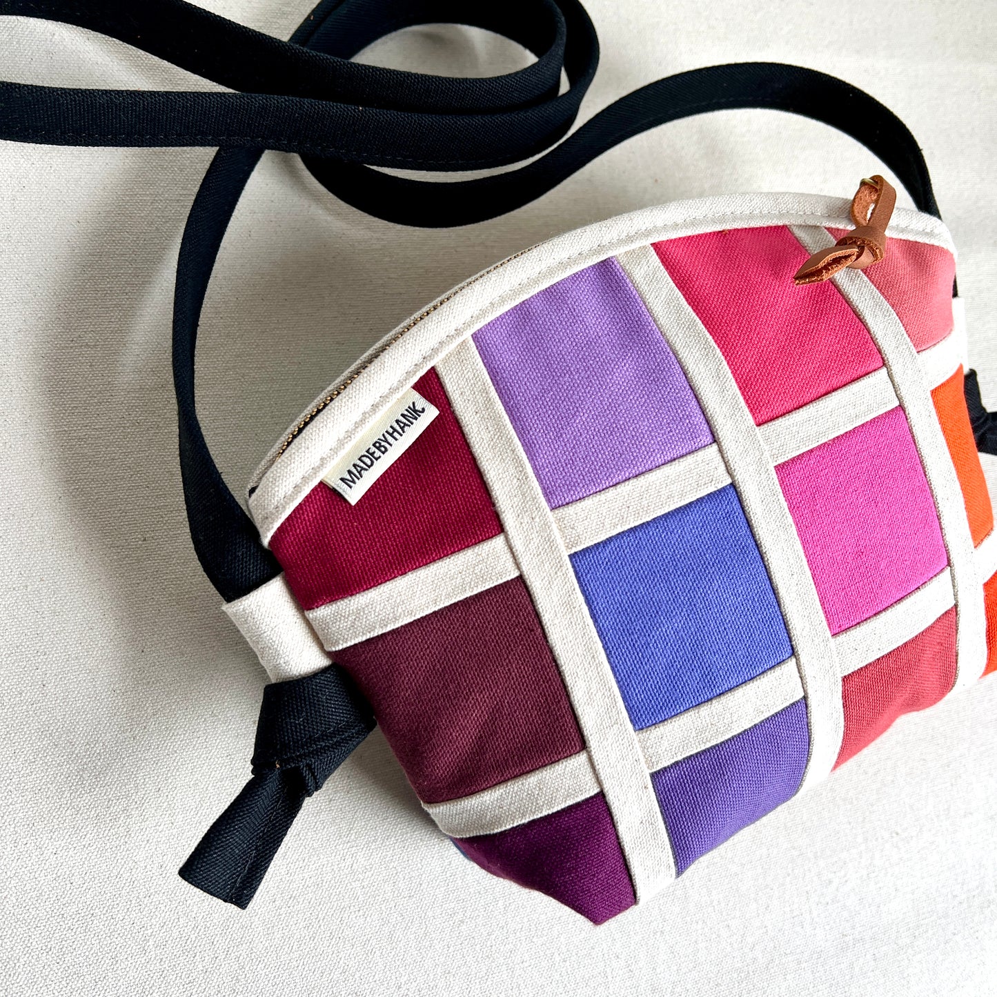 double-sided grid crossbody, natural with rainbow