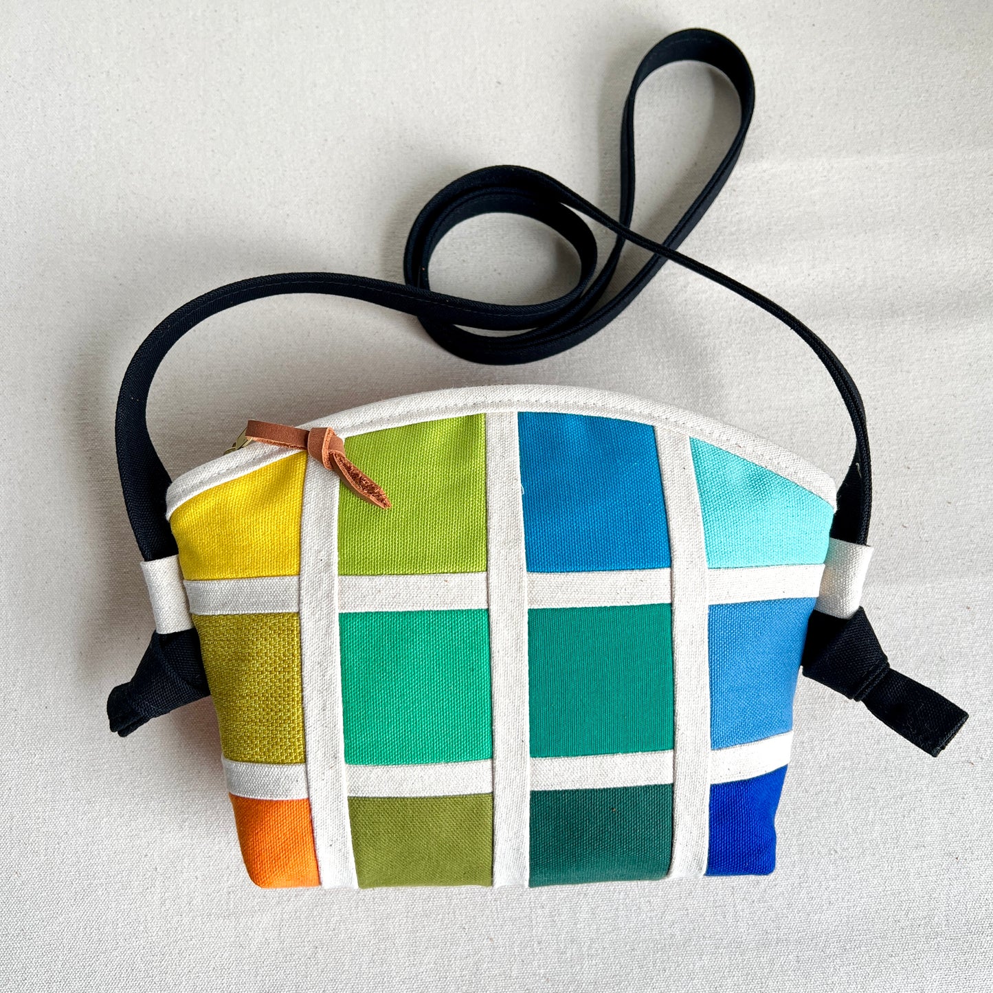 double-sided grid crossbody, natural with rainbow