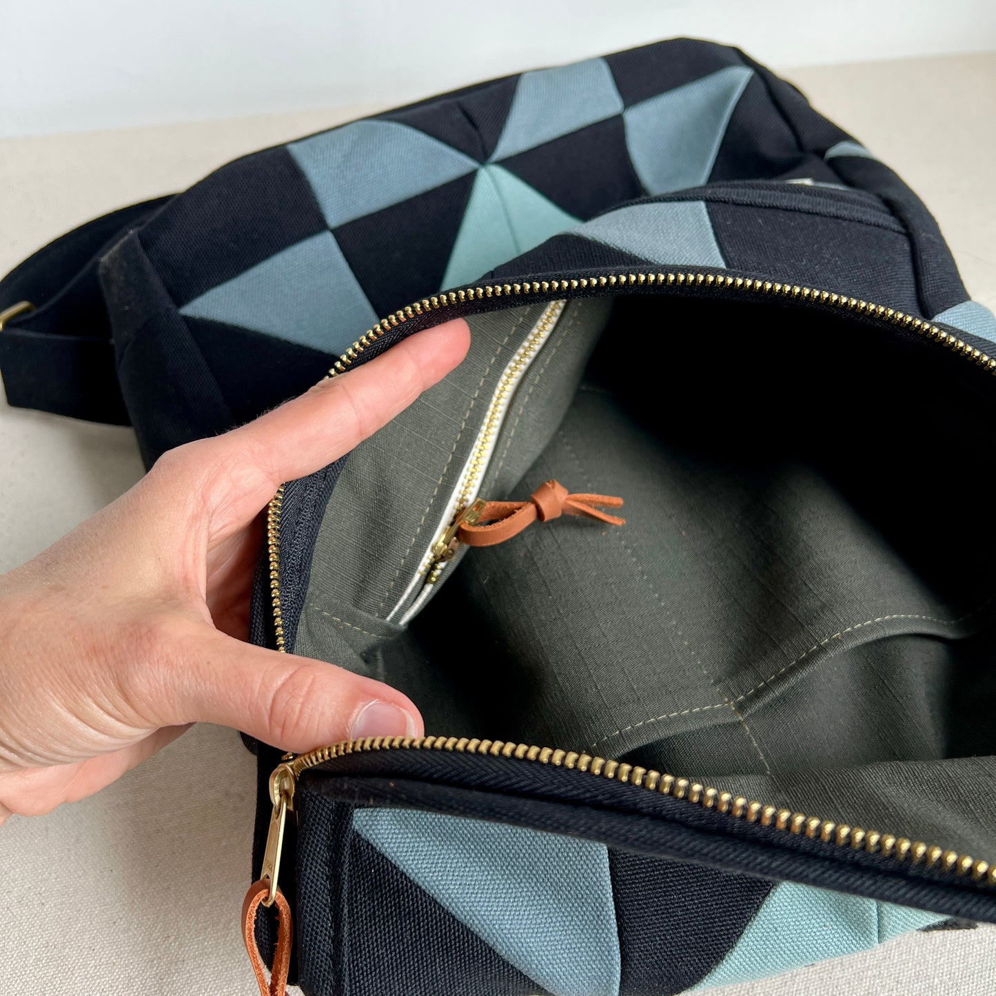sawtooth star backpack, black with steel blue and muted aqua