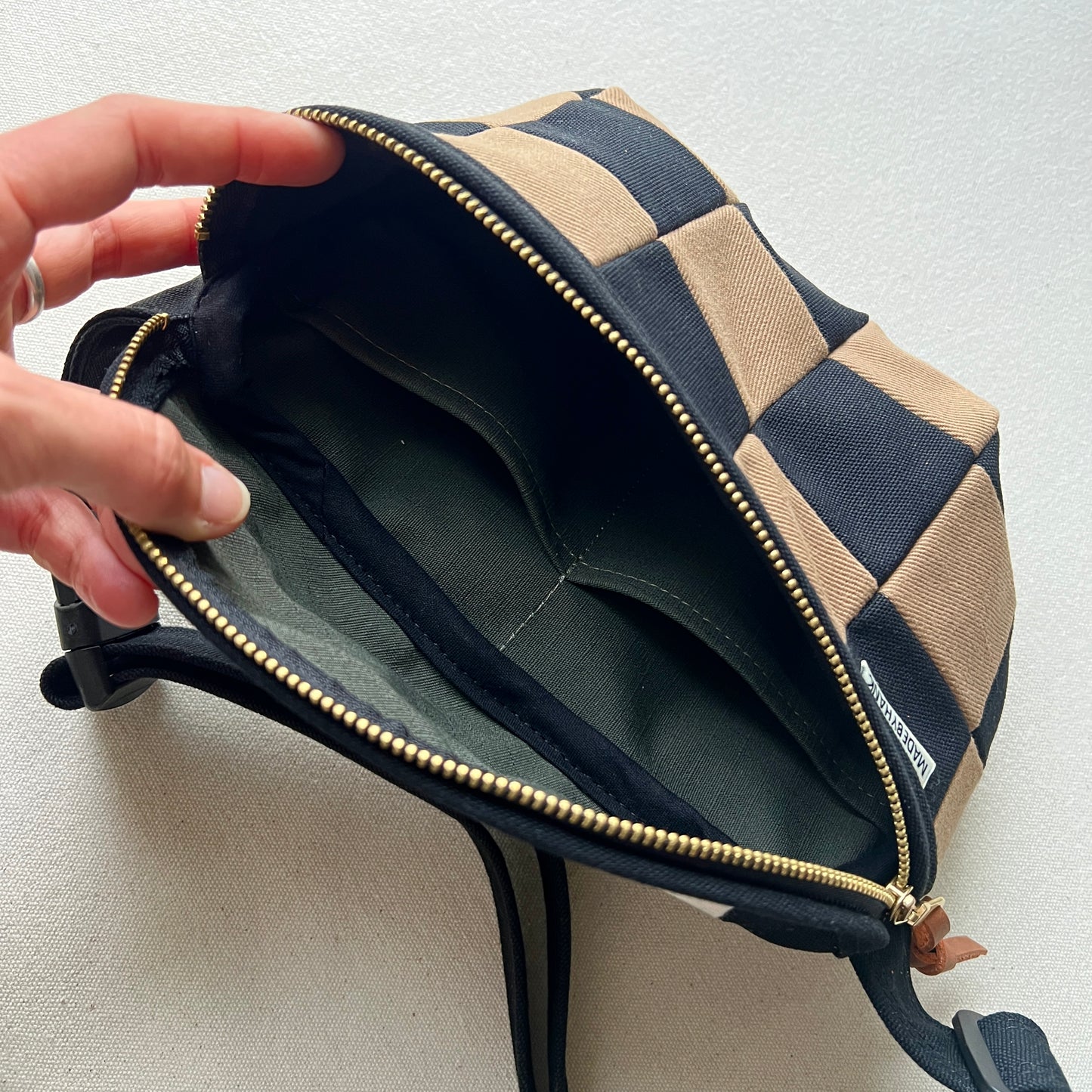 checkerboard fanny bag, black + sand