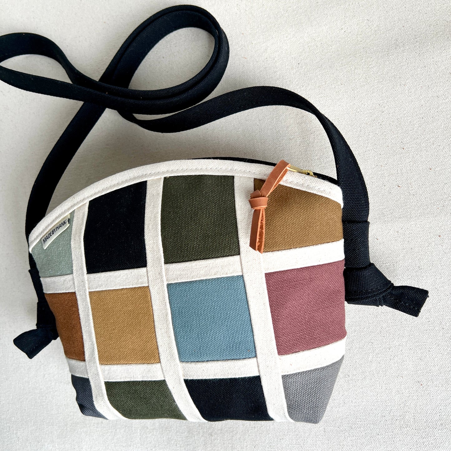 double-sided grid bag, natural and muted shades/ black with and muted shades