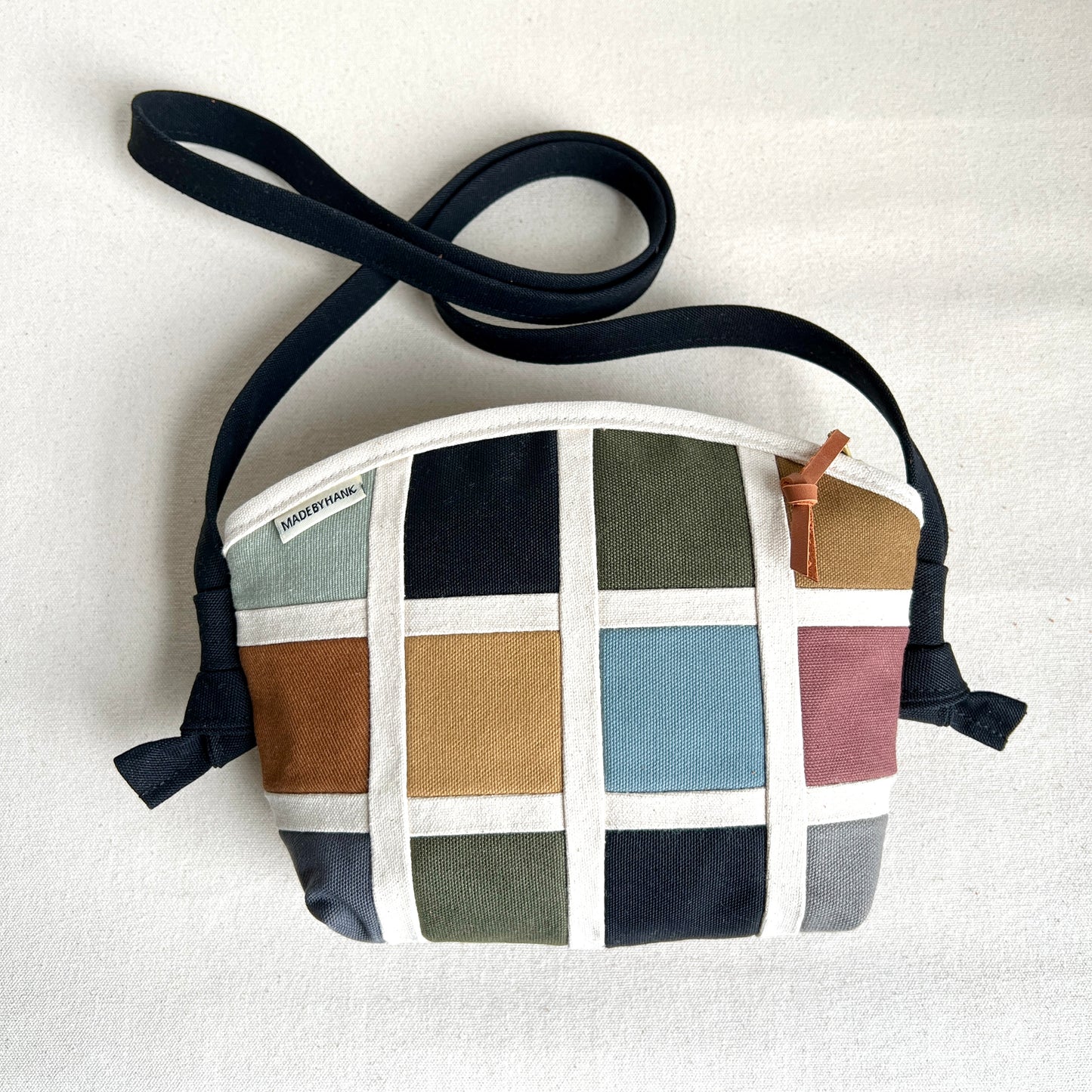 double-sided grid bag, natural and muted shades/ black with and muted shades