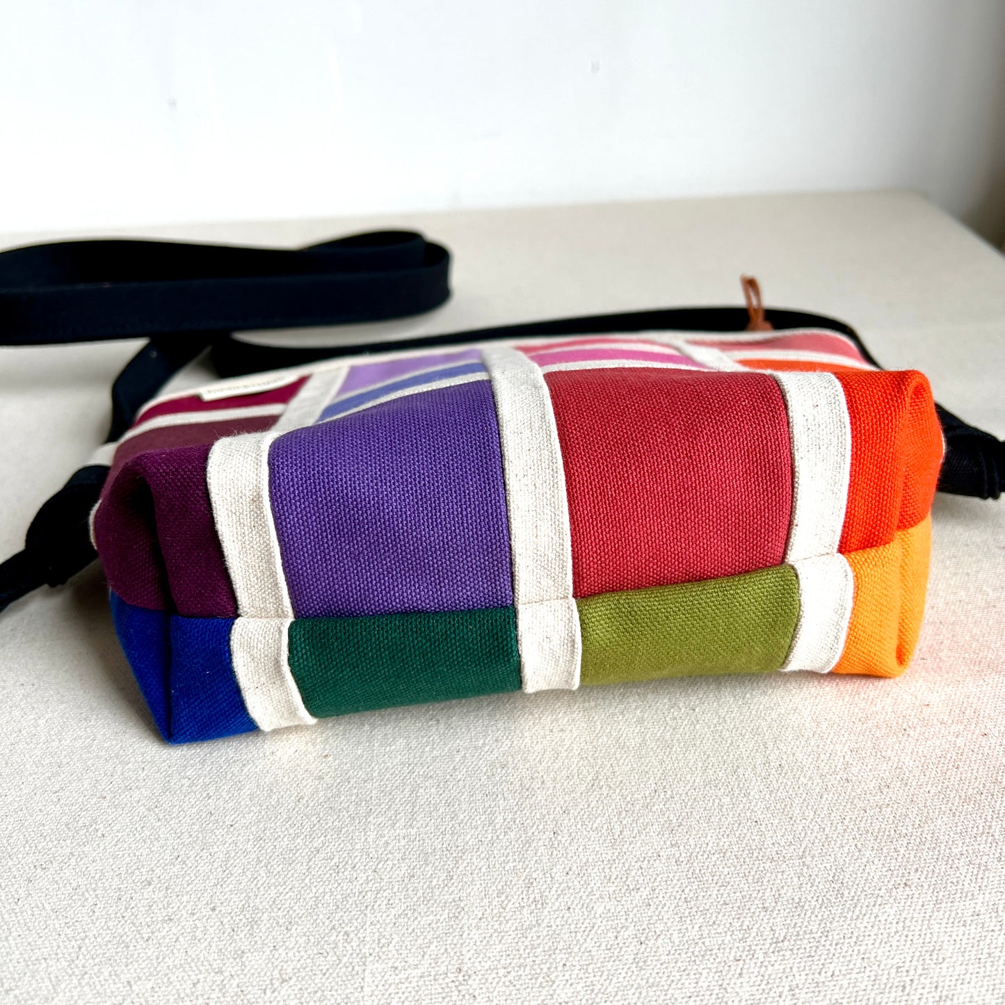 double-sided grid crossbody, natural with rainbow