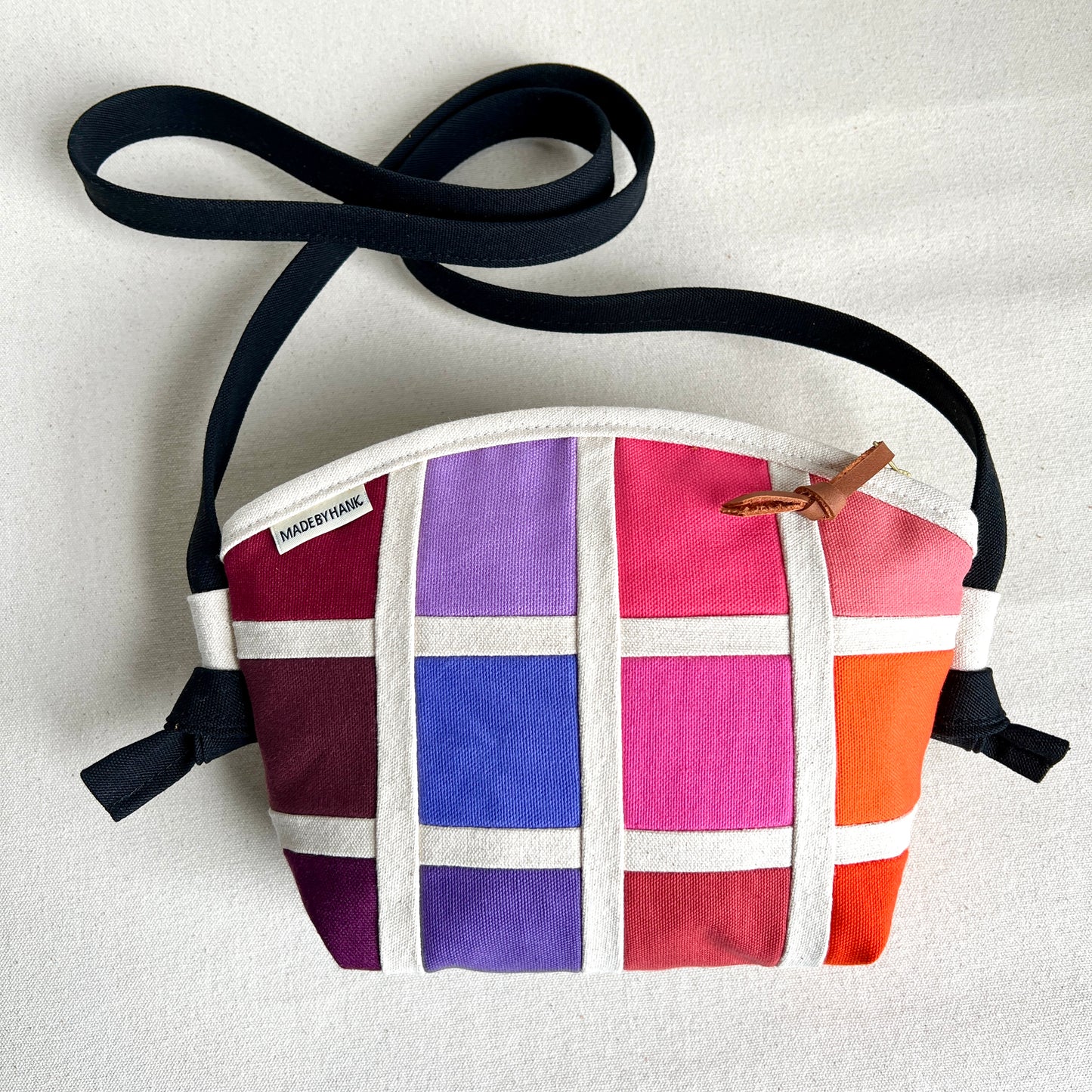 double-sided grid crossbody, natural with rainbow