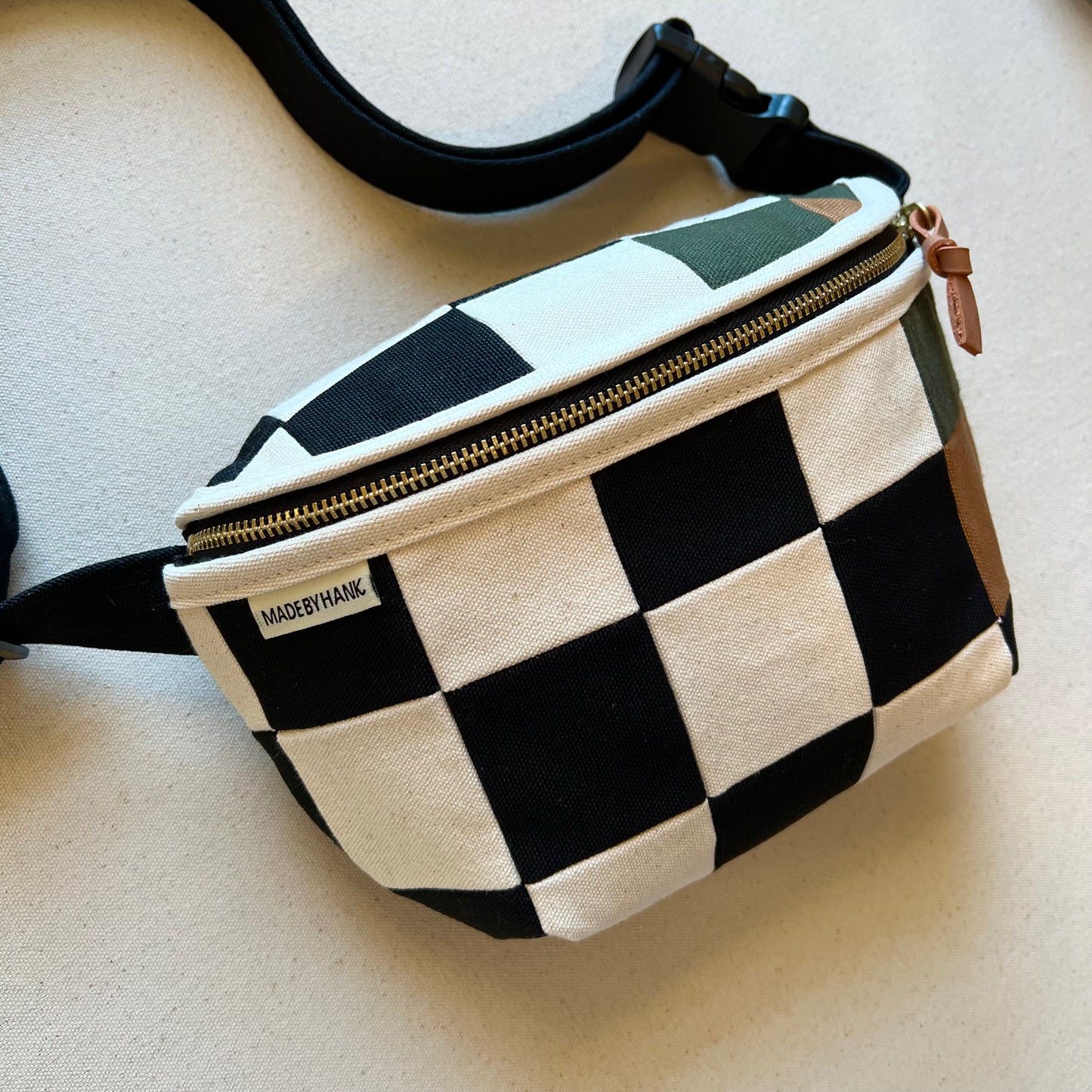 checkerboard fanny bag, black+natural with forest+caramel