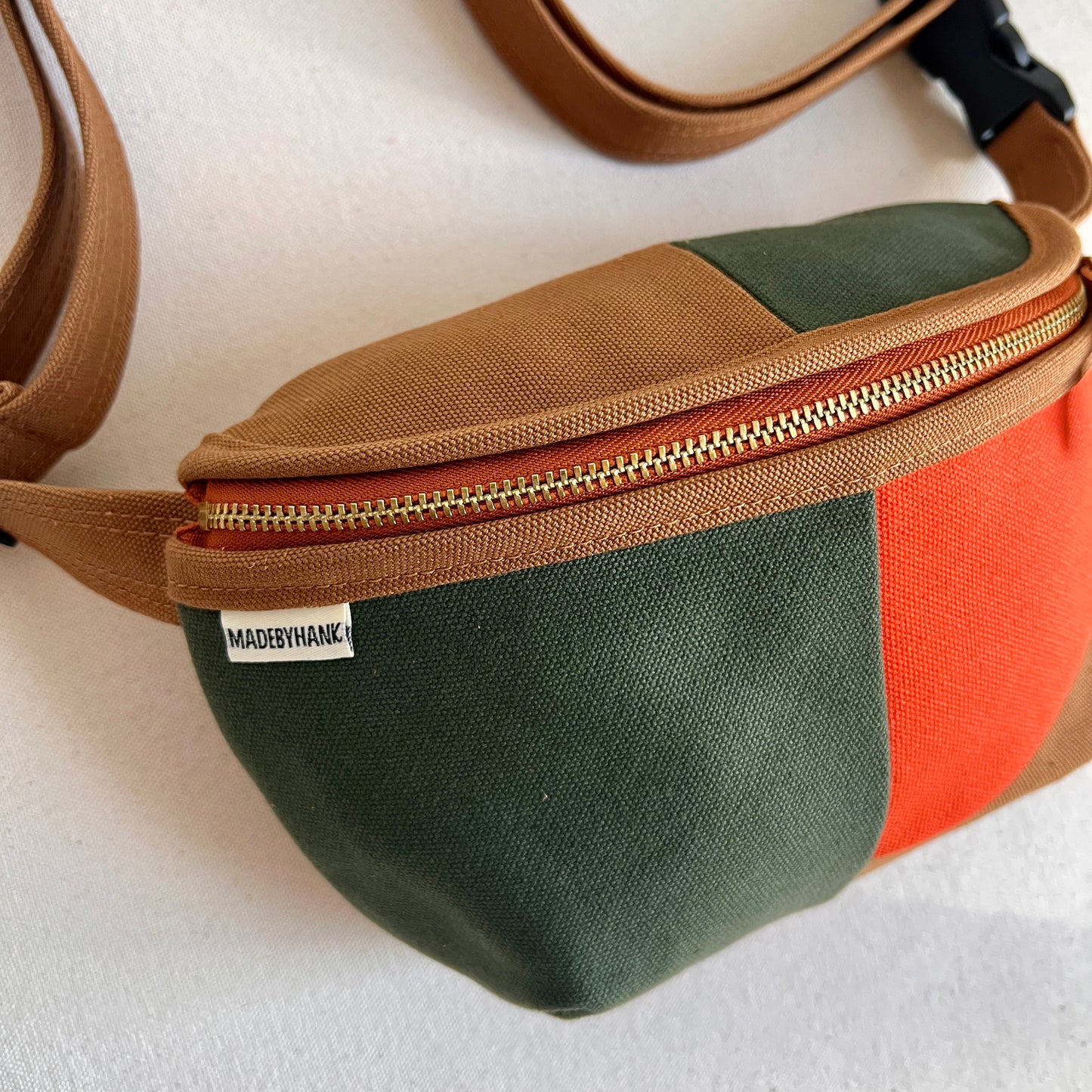 ** PRE-ORDER**  color block fanny bag, forest + caramel with tangerine