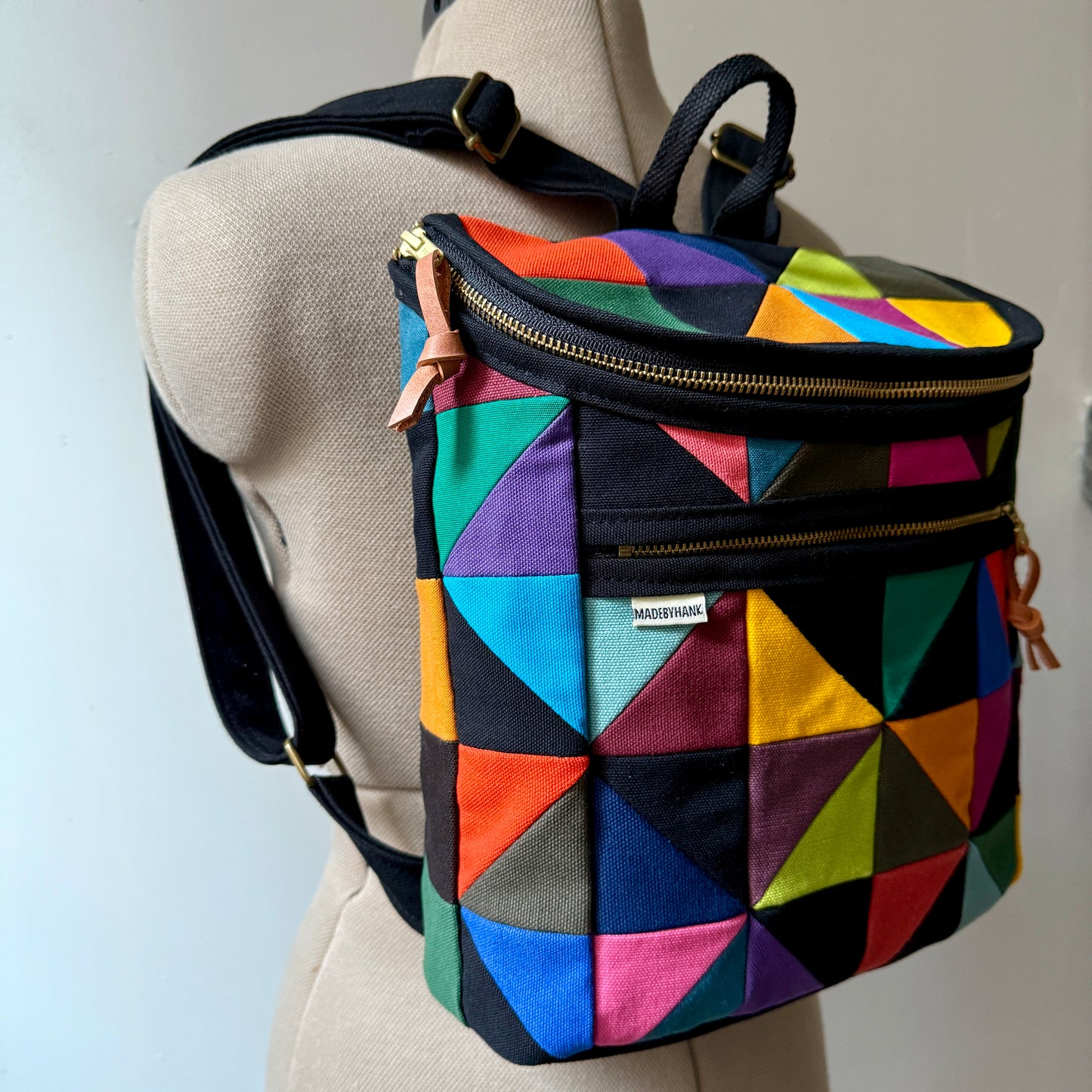original size backpack, party triangles (black)