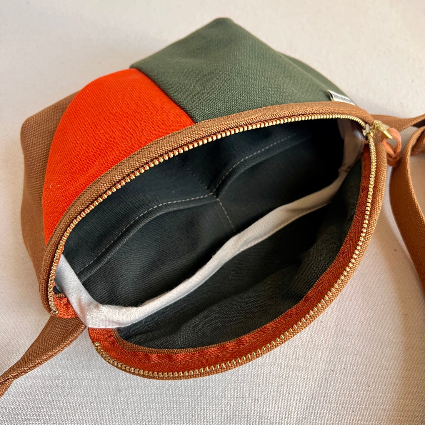 ** PRE-ORDER**  color block fanny bag, forest + caramel with tangerine