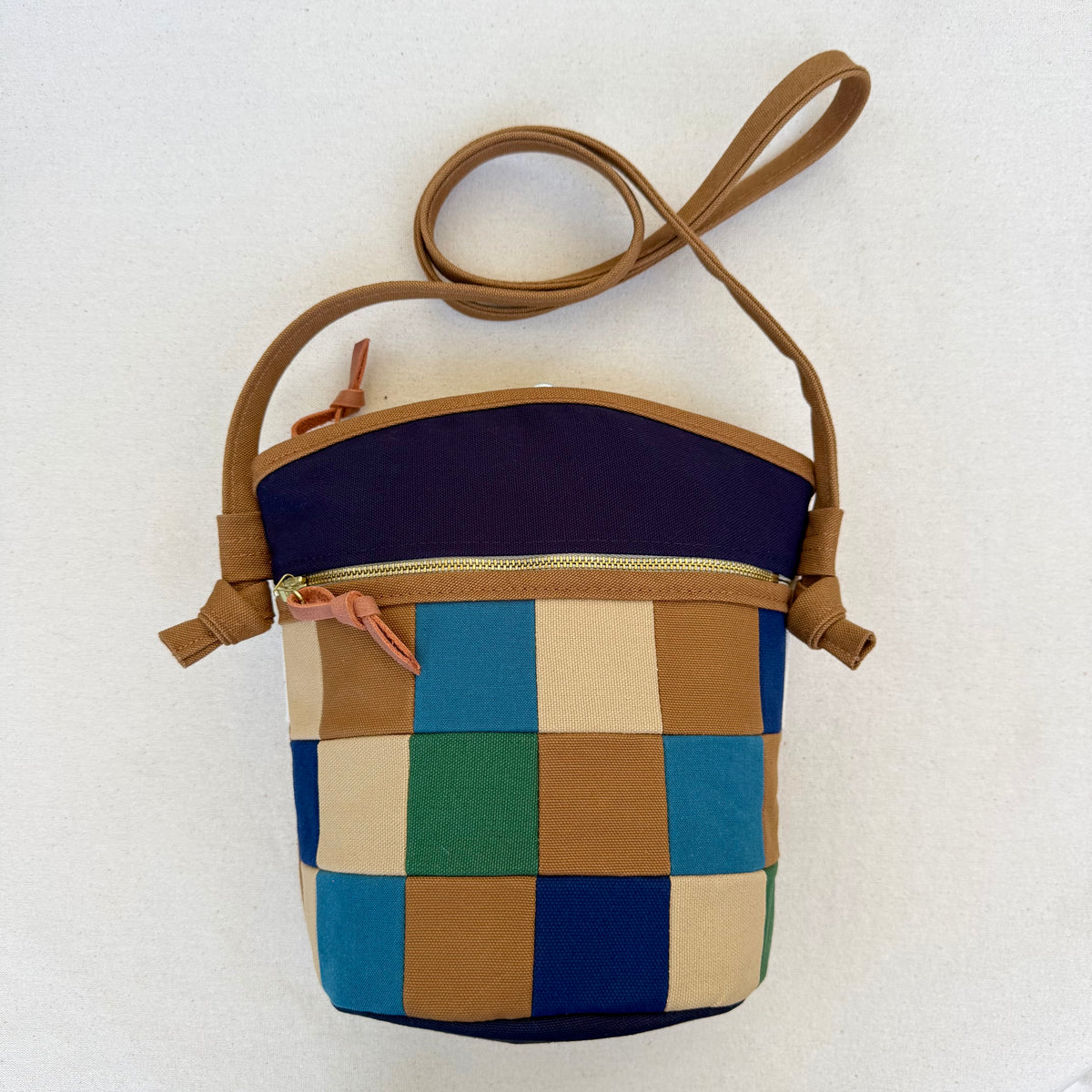 The Emmy Crossbody, pieced work tulip in natural/caramel/blues+greens