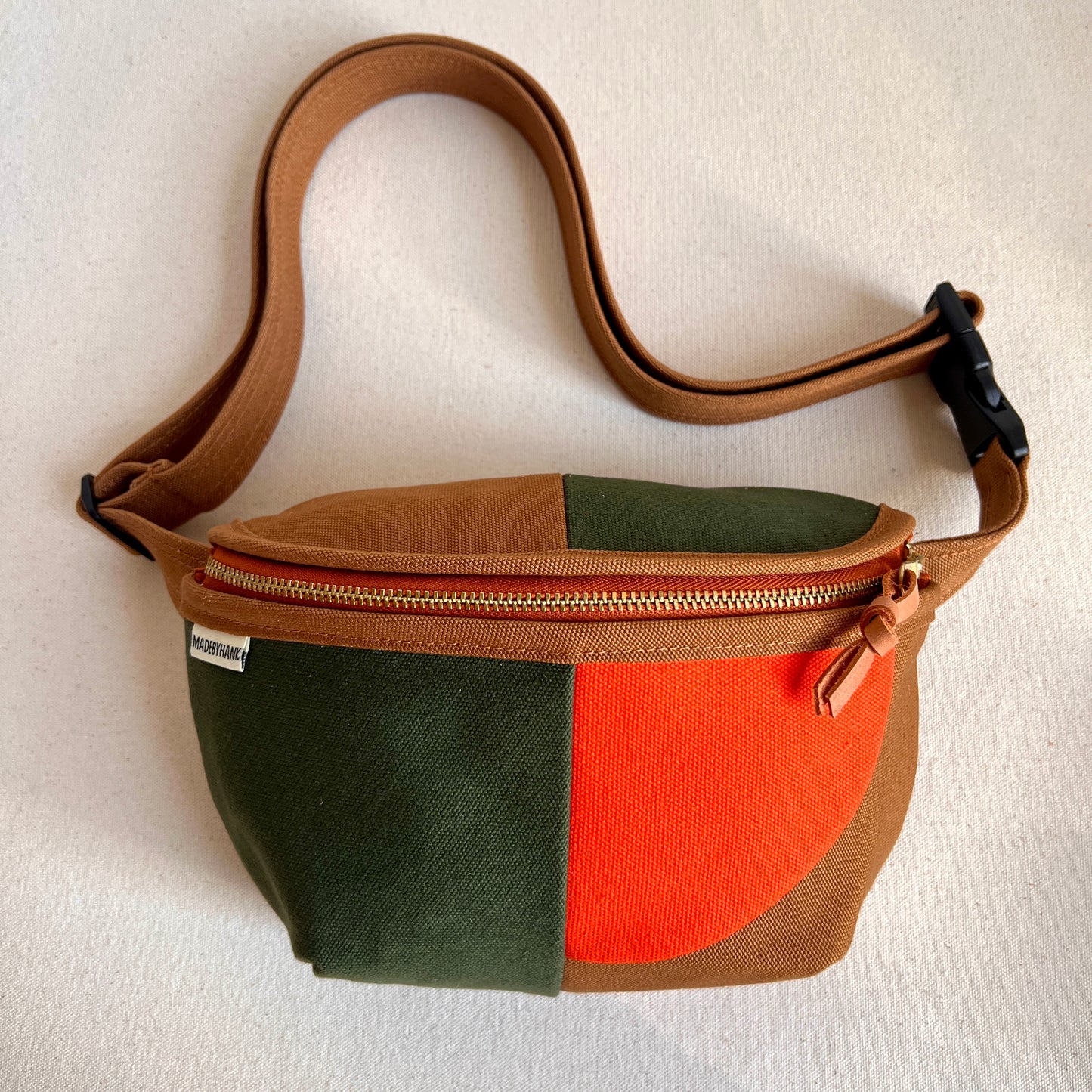 ** PRE-ORDER**  color block fanny bag, forest + caramel with tangerine