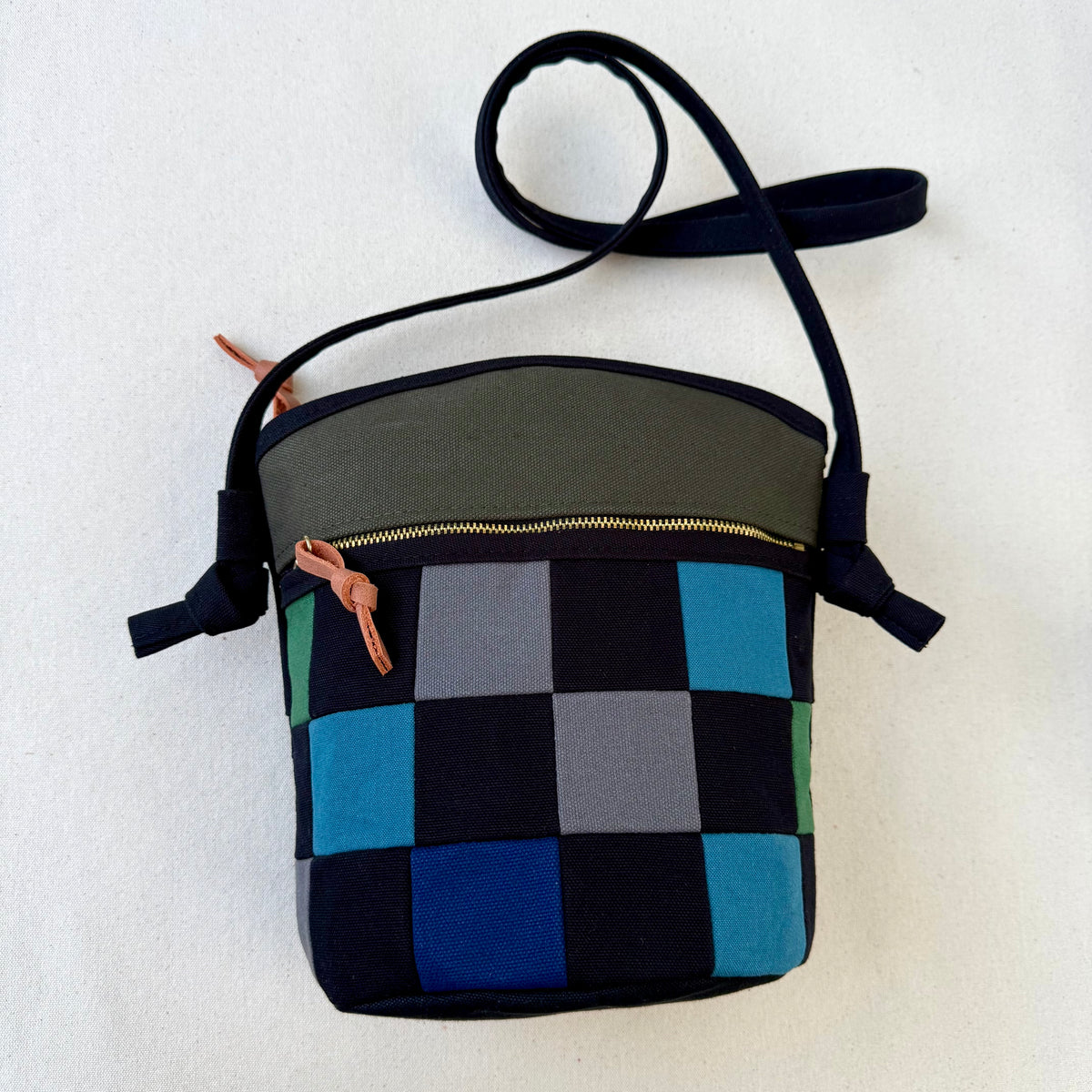 The Emmy Crossbody, pieced work tulip in black with turquoise/jade/raspberry etc