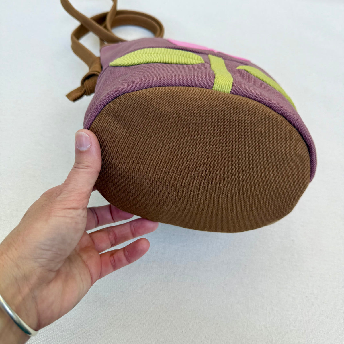 The Emmy Crossbody, pieced work tulip in mauve with flamingo pink and celery