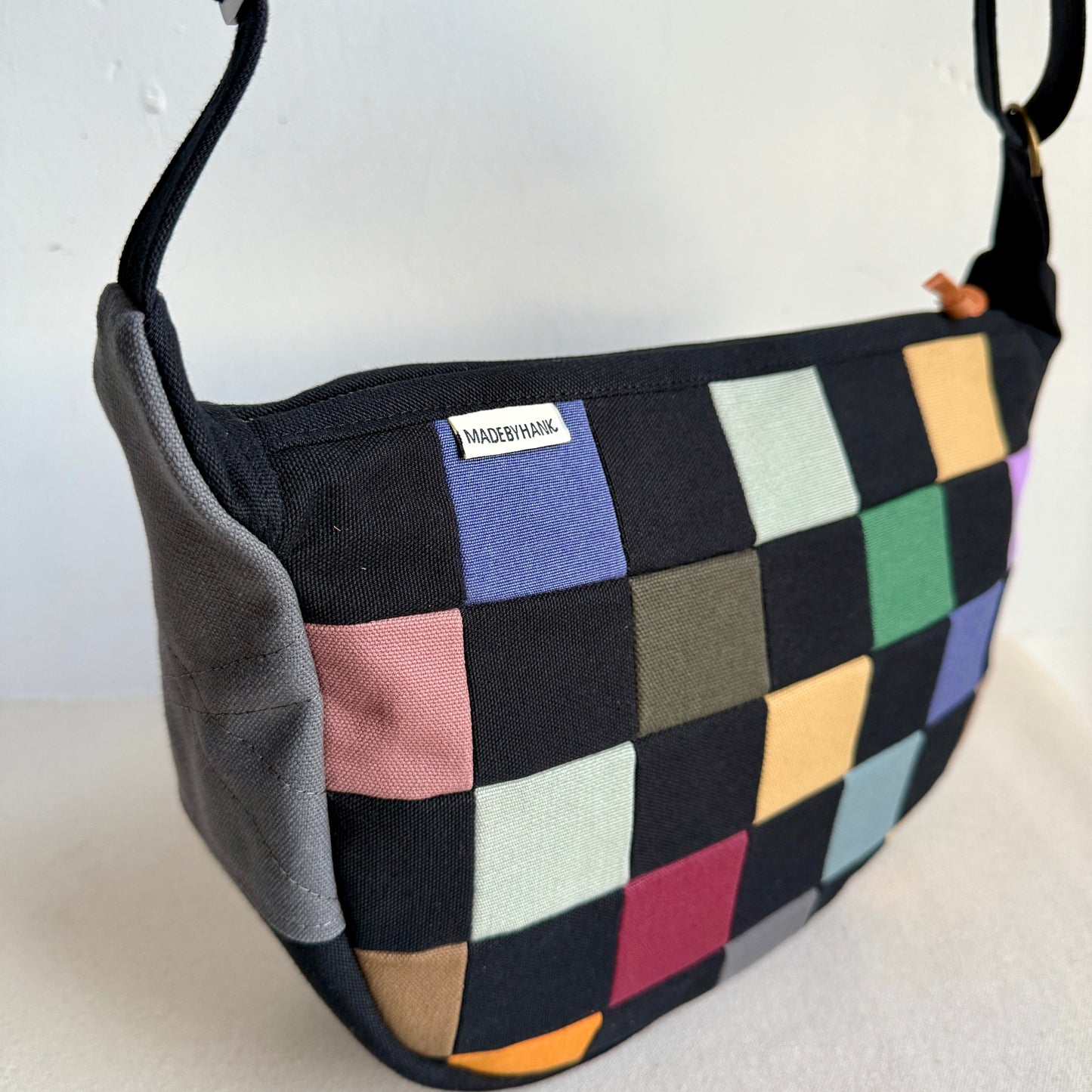 checkerboard crescent bag, black with multi