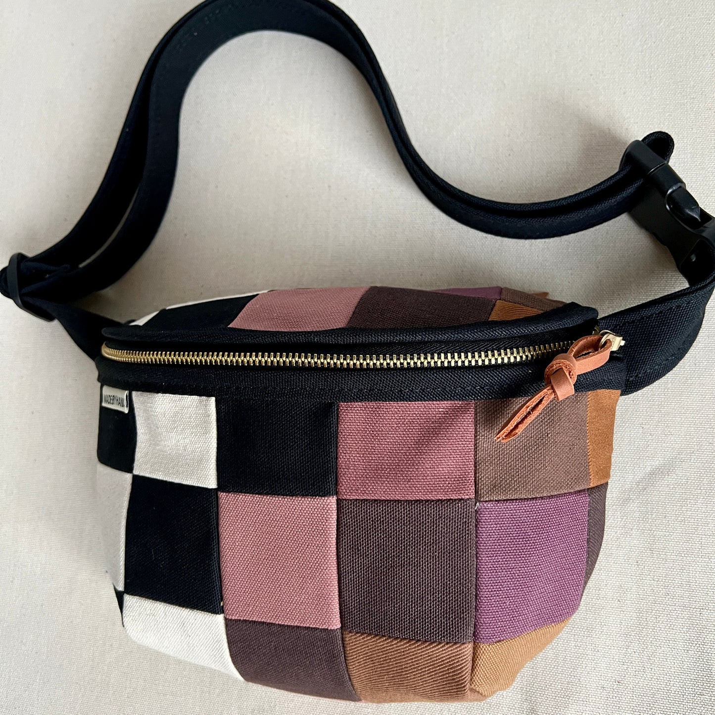checkerboard fanny bag, black + natural with mauve +browns