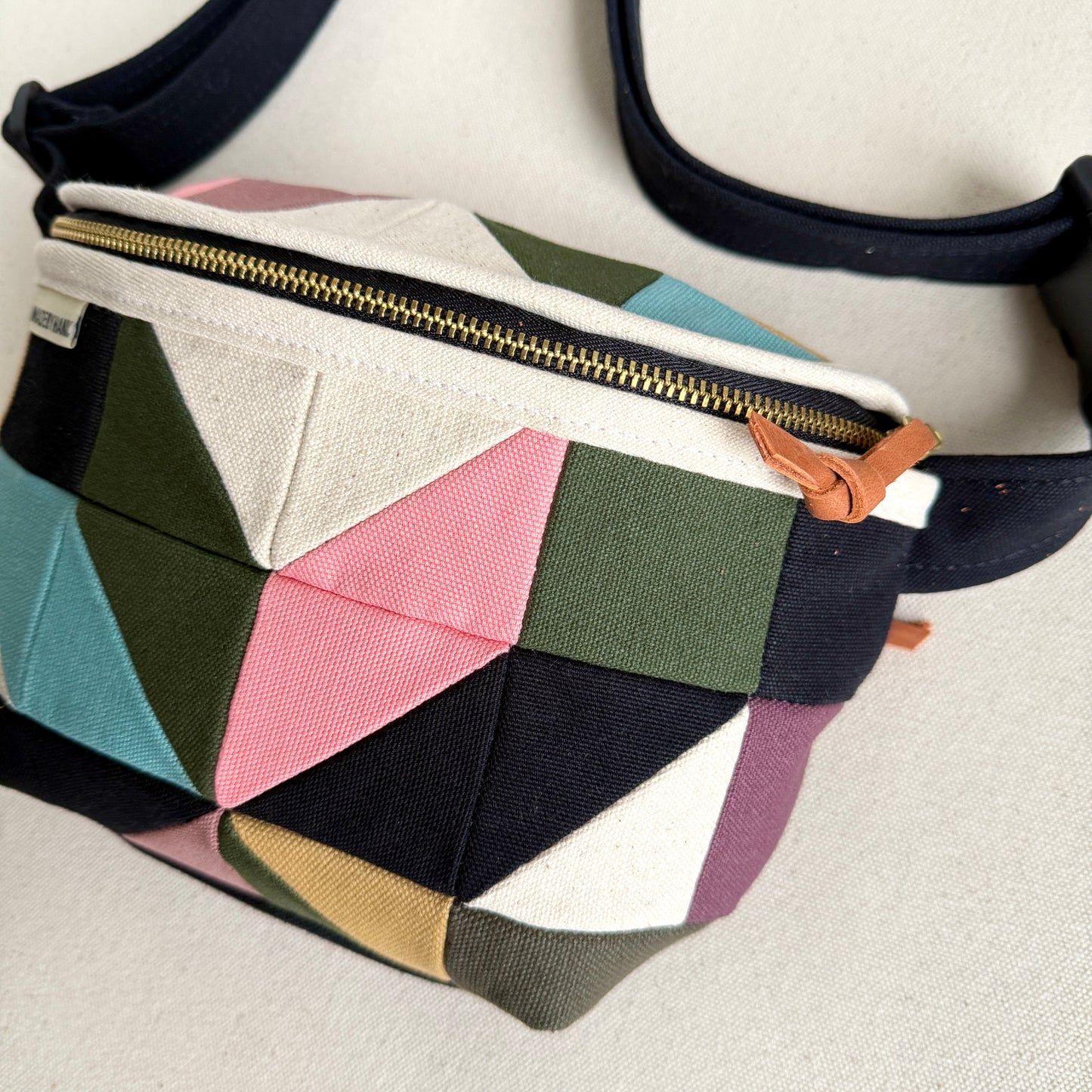pinwheel star fanny bag, natural with mauve/black/forest/steel/honey/pink