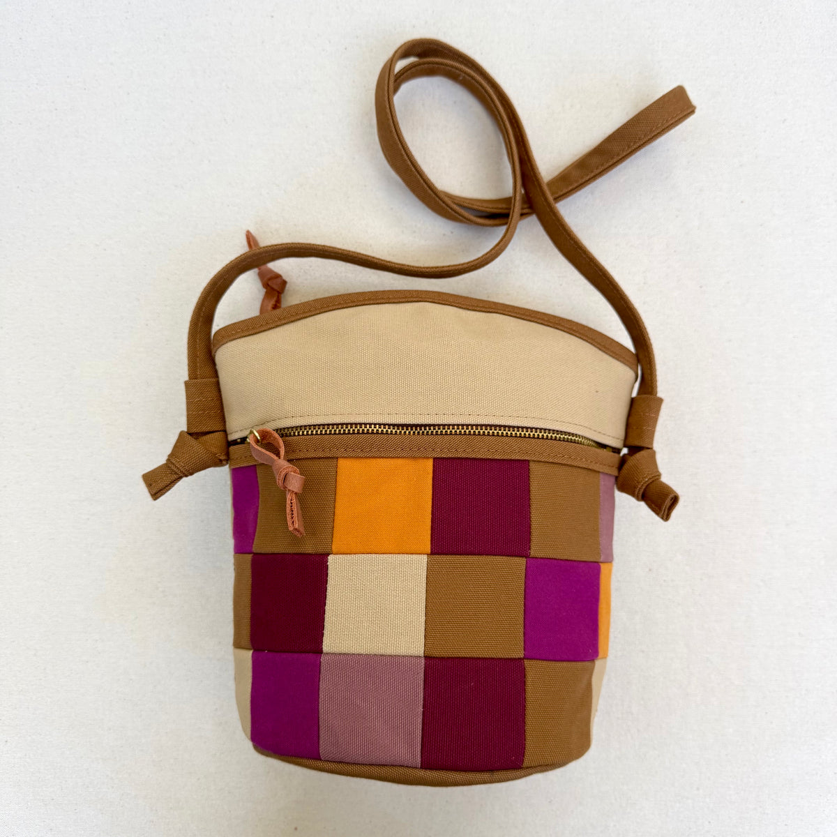 The Emmy Crossbody, pieced work tulip in honey and espresso with pinks