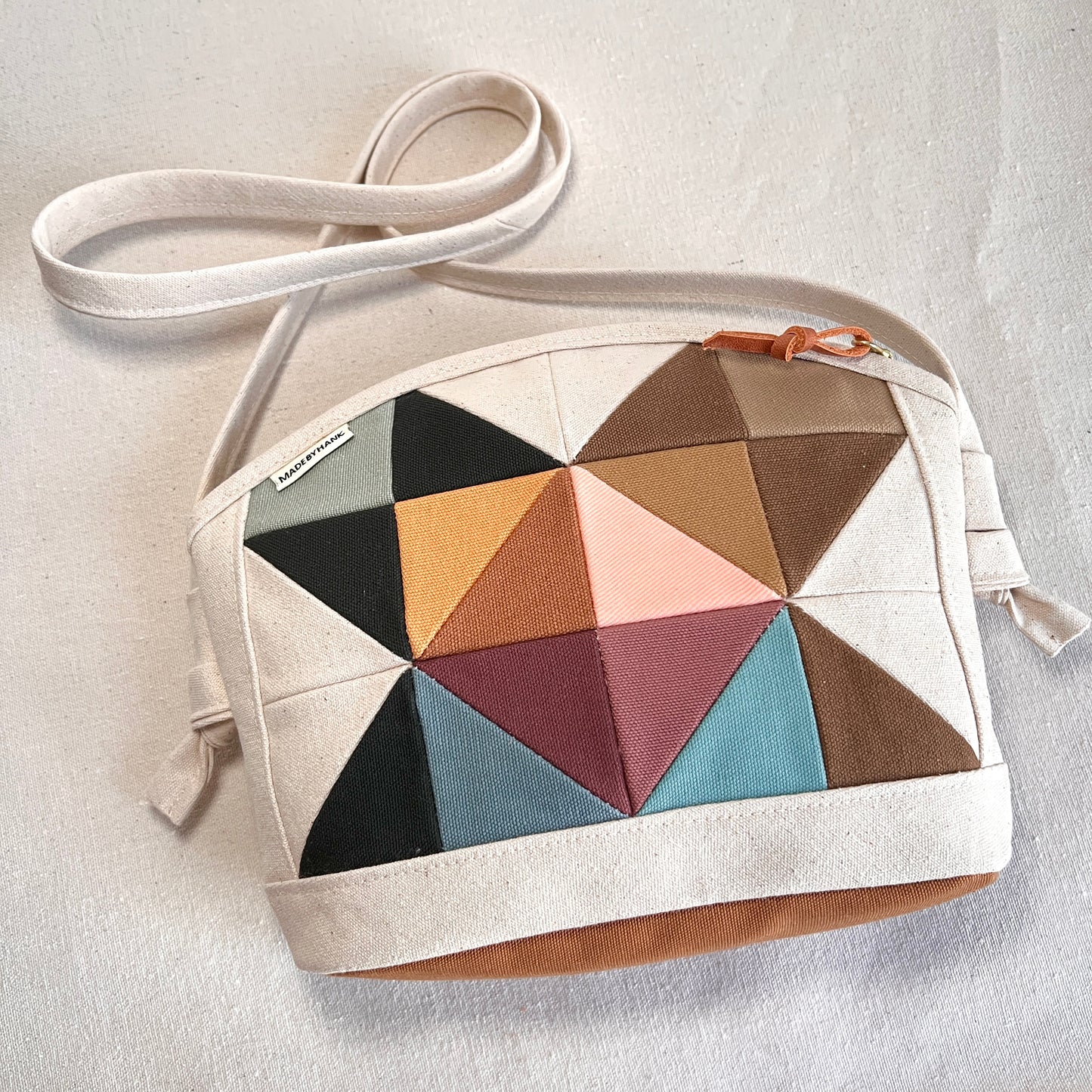 rounded-top crossbody, muted multi (natural)