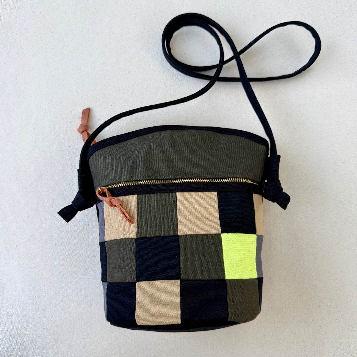 The Emmy Crossbody, pieced work tulip in dark olive/black/natural/neon