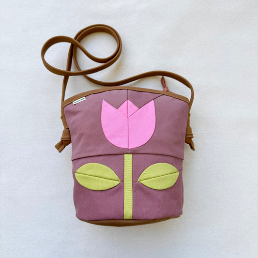 The Emmy Crossbody, pieced work tulip in mauve with flamingo pink and celery