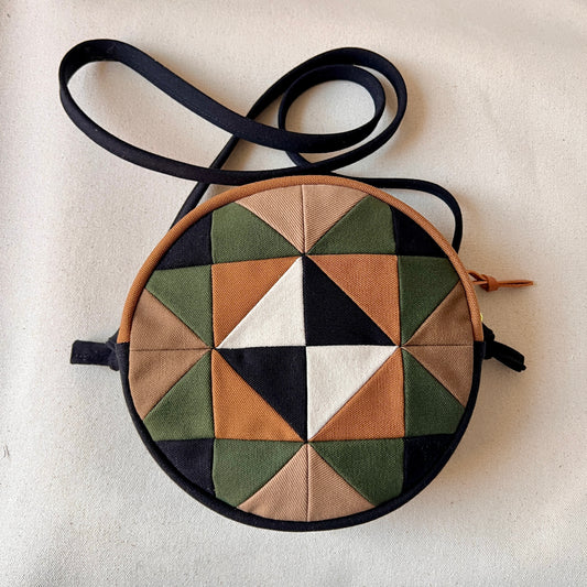 circle crossbody, caramel/sand/forest/black/natural with hints of neon green