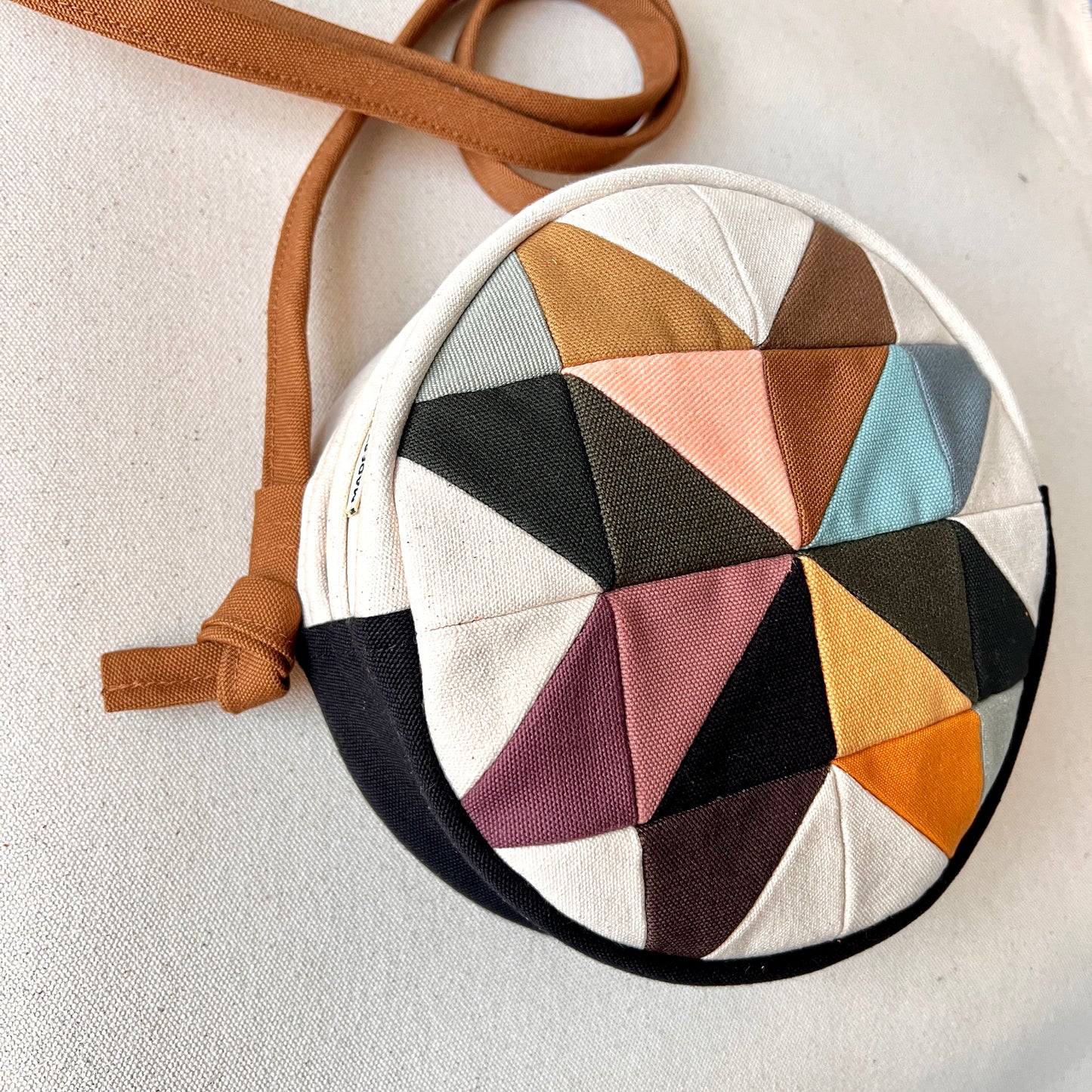 circle crossbody, pinwheel star