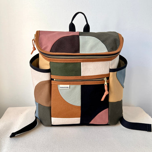 NEW! Roomier Backpack with Side Pockets, Party Neutral