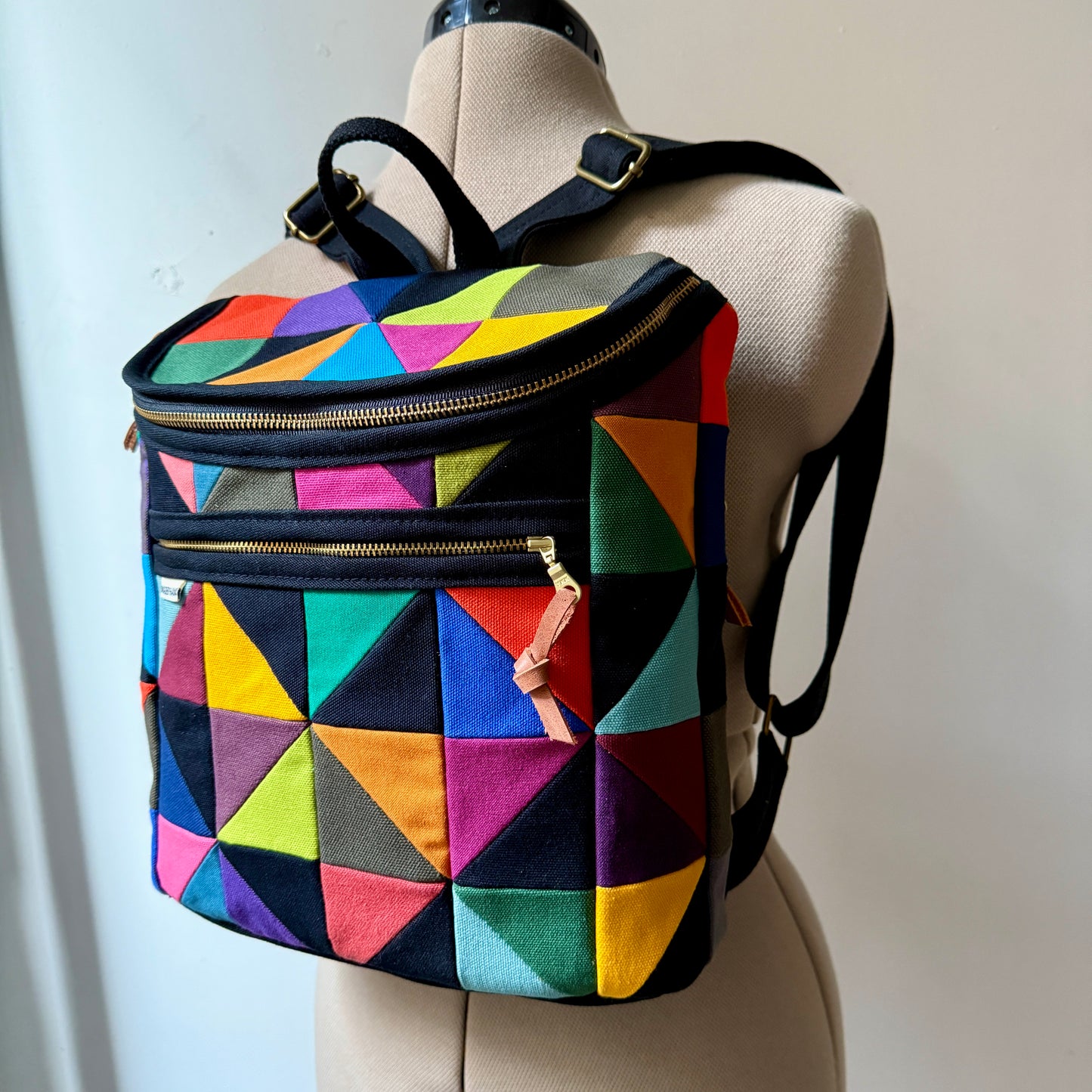 original size backpack, party triangles (black)