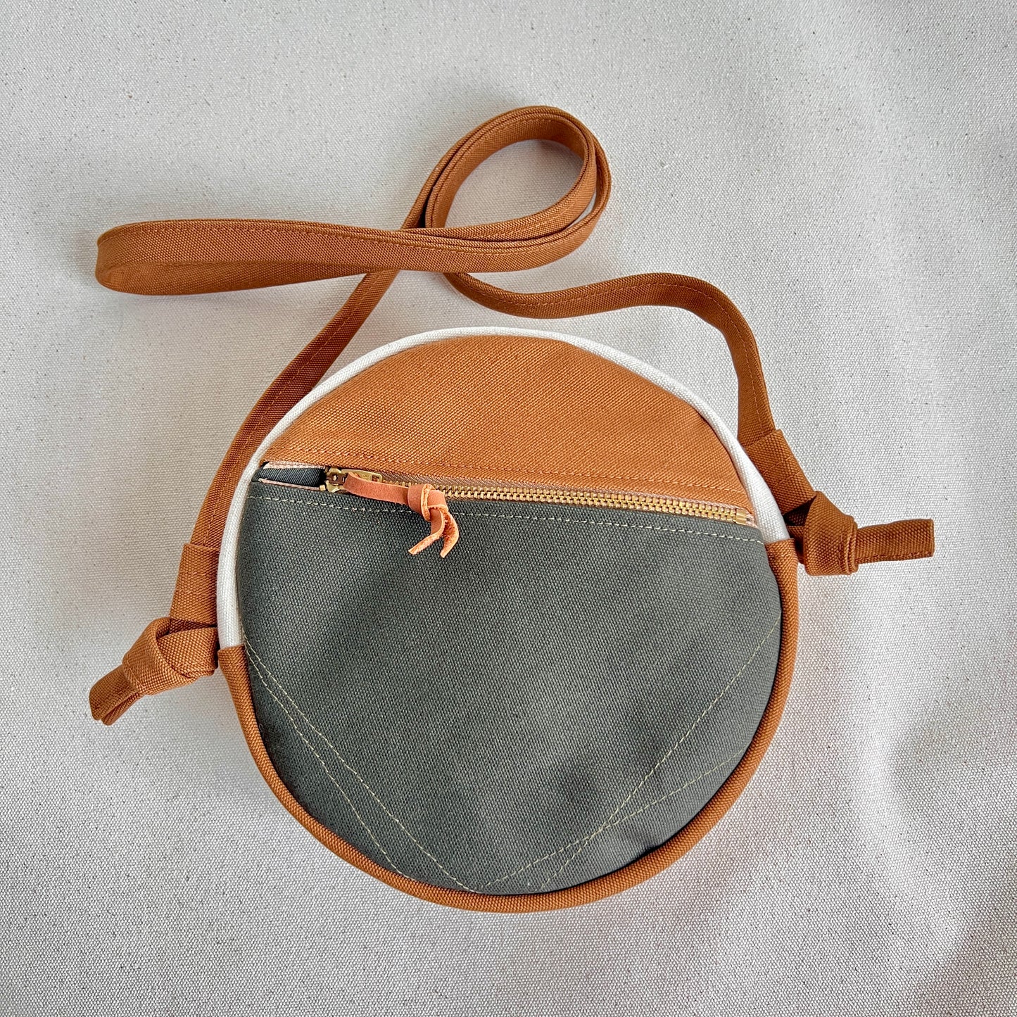 circle crossbody, caramel/ochre/sunshine/peach