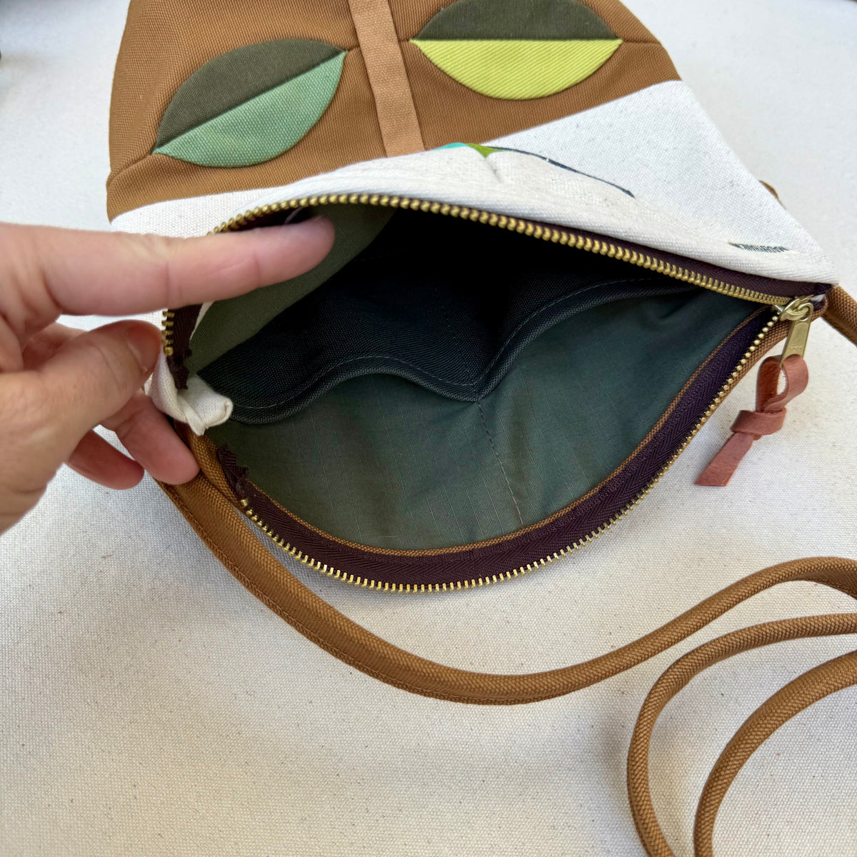 The Emmy Crossbody, pieced work tulip in natural/caramel/blues+greens