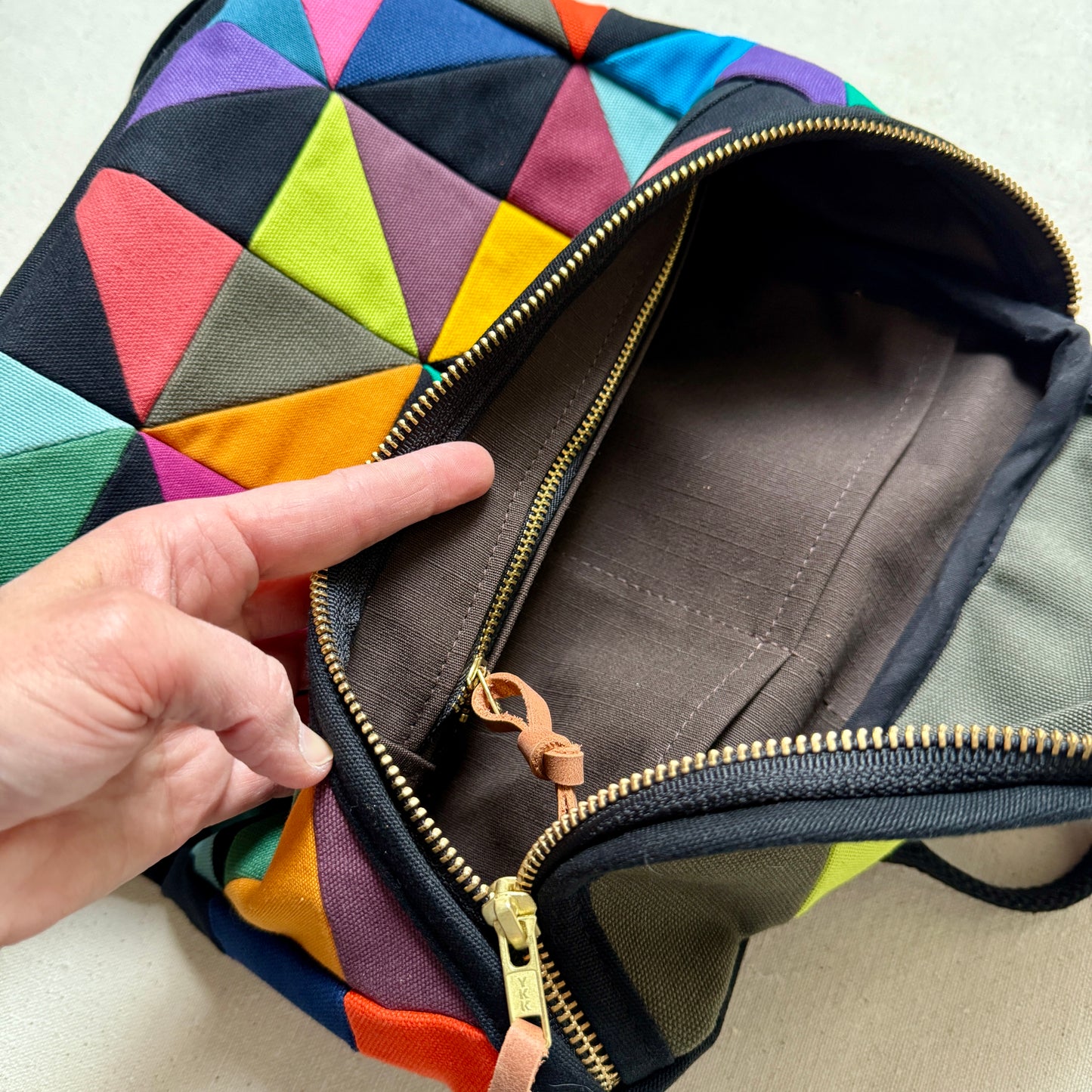 original size backpack, party triangles (black)