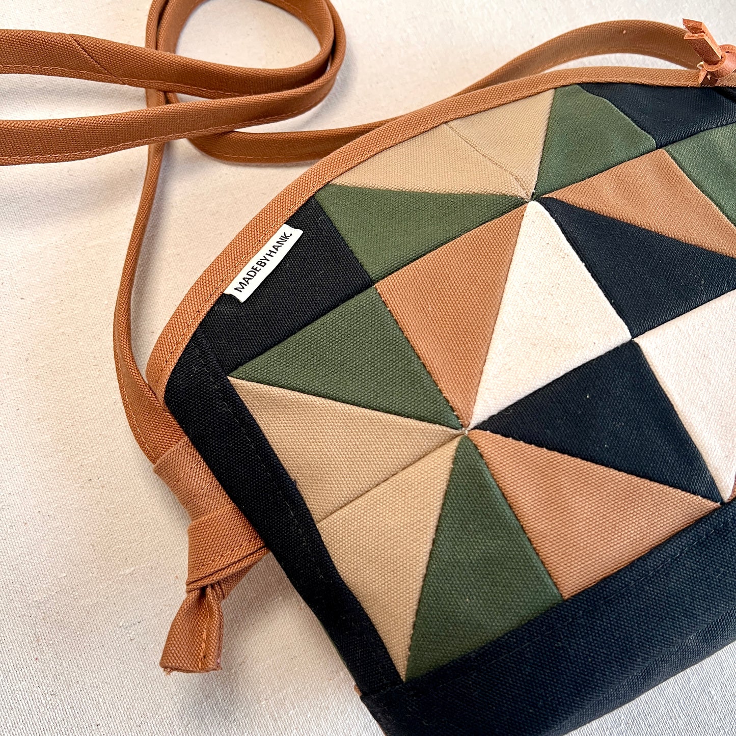 rounded-top quilt star crossbody, forest/black/sand/natural